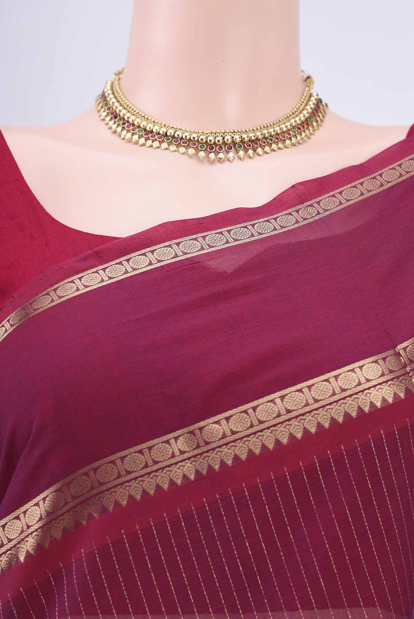 Border image of Dark Pink Kanchi Cotton Saree with Stripes on the body and Zari Border. 