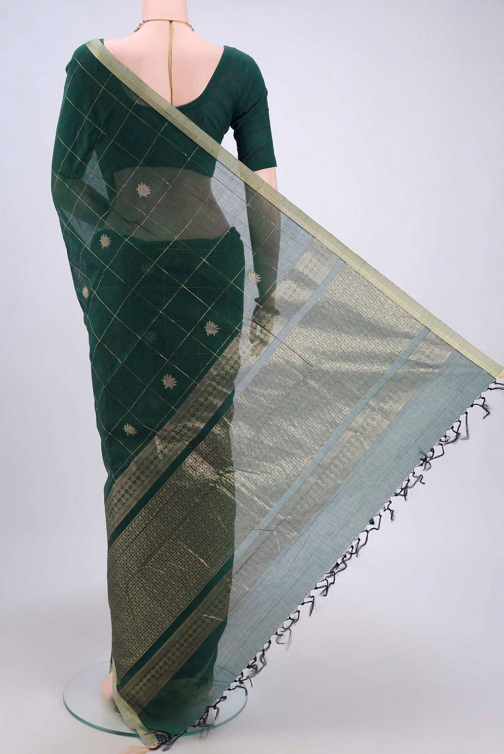 Flat view of Bottle Green Kanchi Cotton Saree with Checked design on the body and Zari Border. 