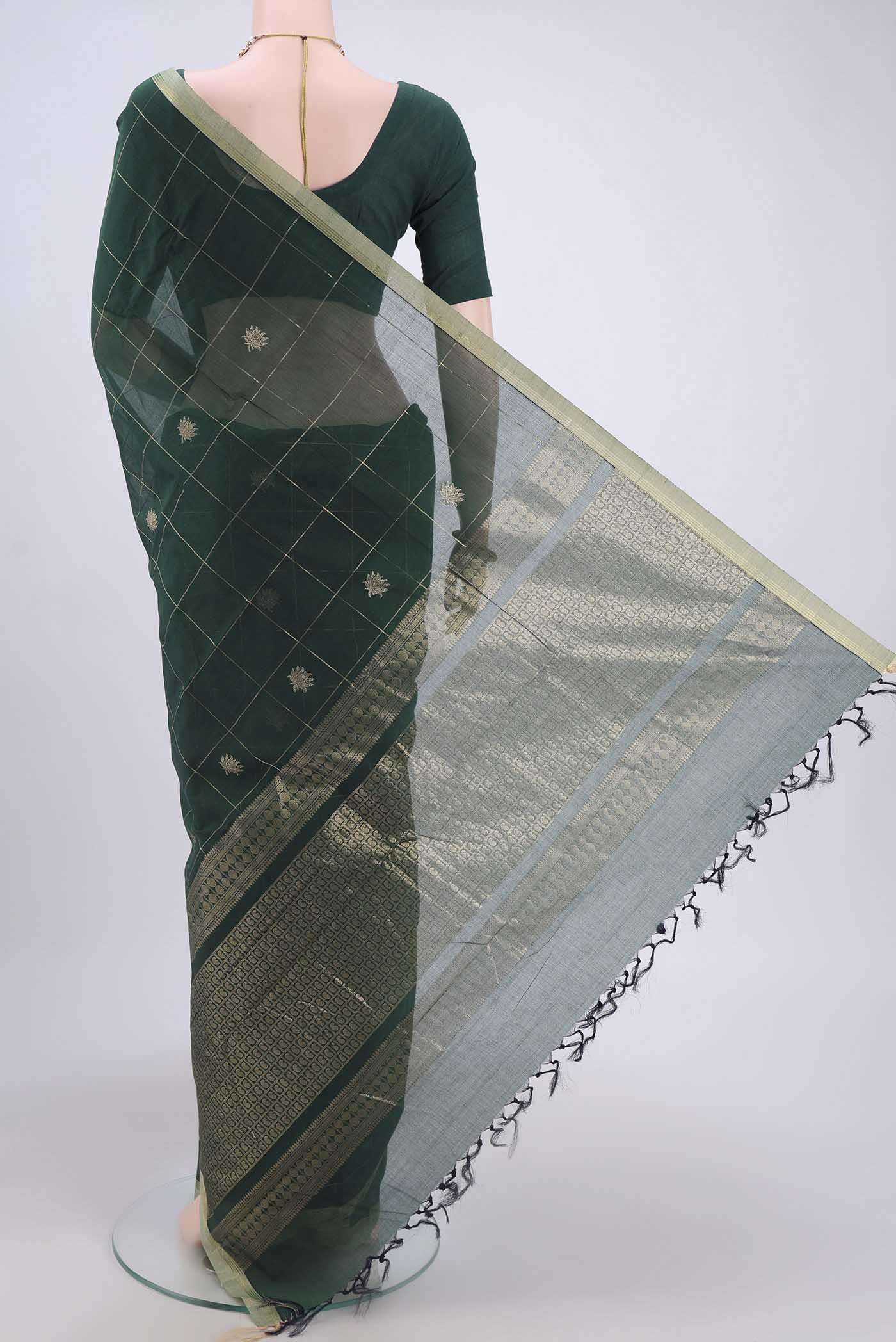 Flat view of Bottle Green Kanchi Cotton Saree with Checked design on the body and Zari Border. 