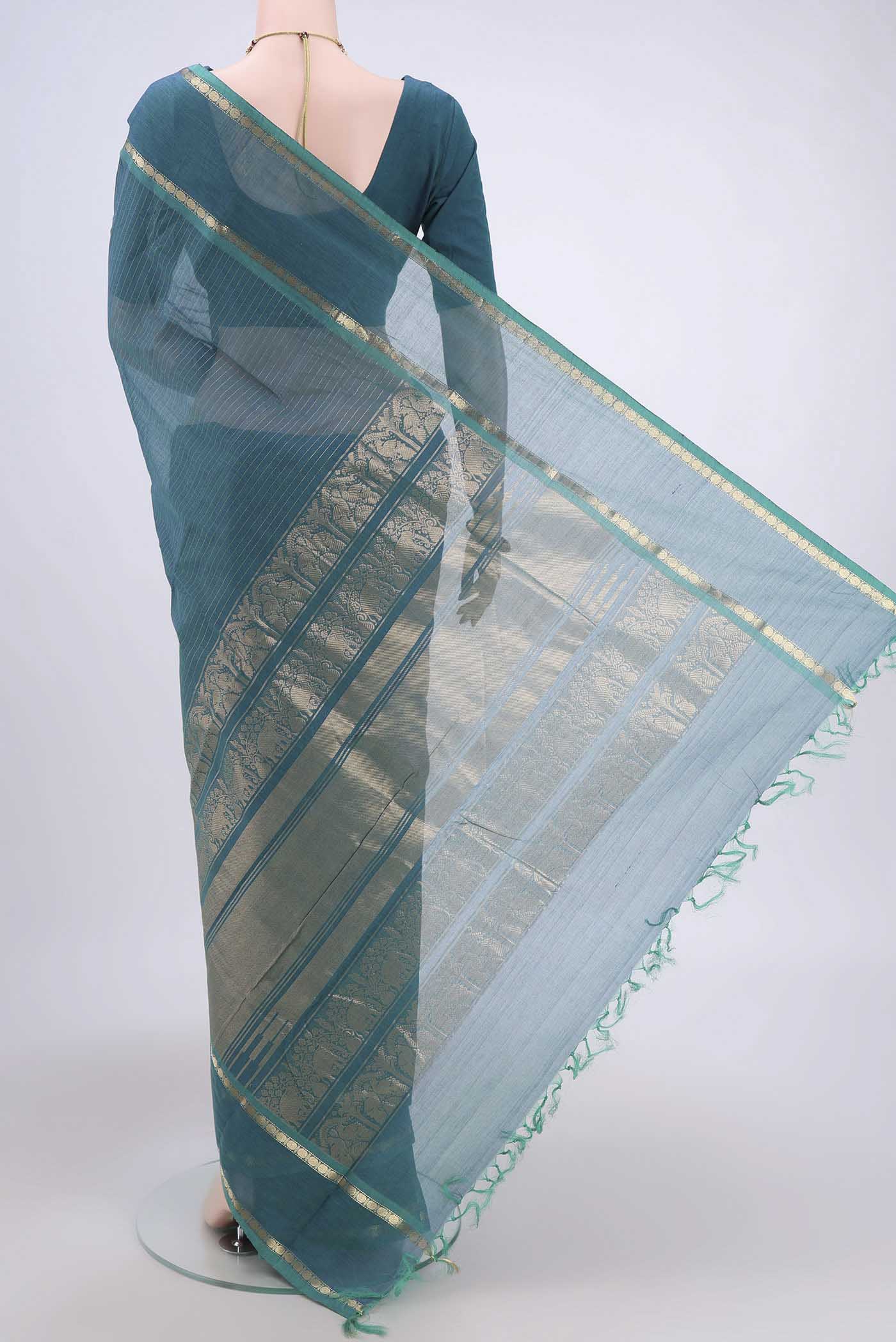Flat view of Sea Green Kanchi Cotton Saree with Stripes on the body and Zari Border. 