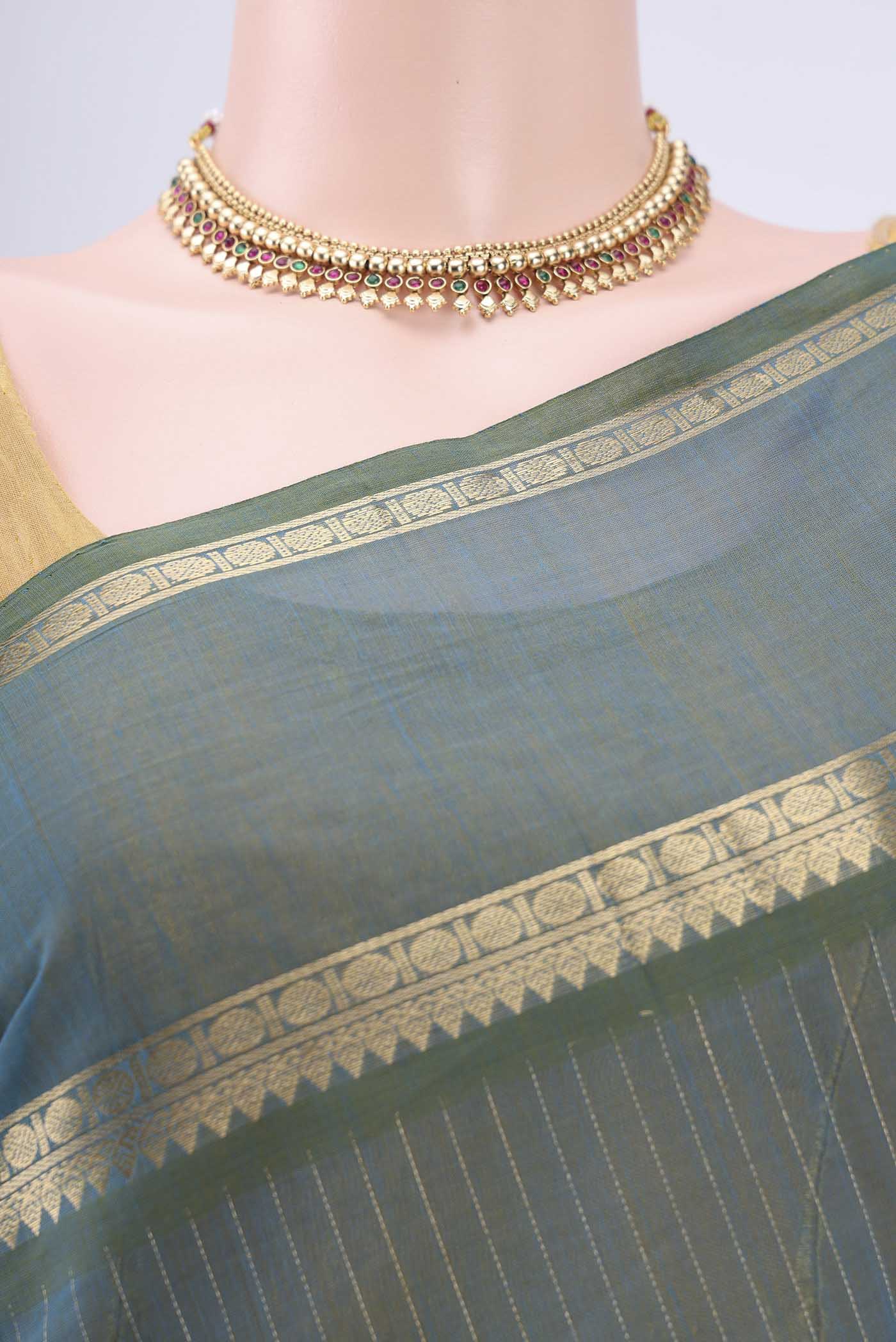 Border image of Green Kanchi Cotton Saree with Stripes on the body and Zari Border. 