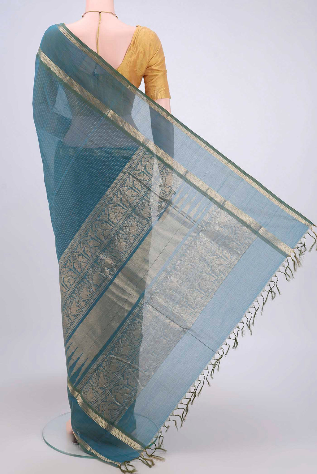 Flat view of Green Kanchi Cotton Saree with Stripes on the body and Zari Border. 