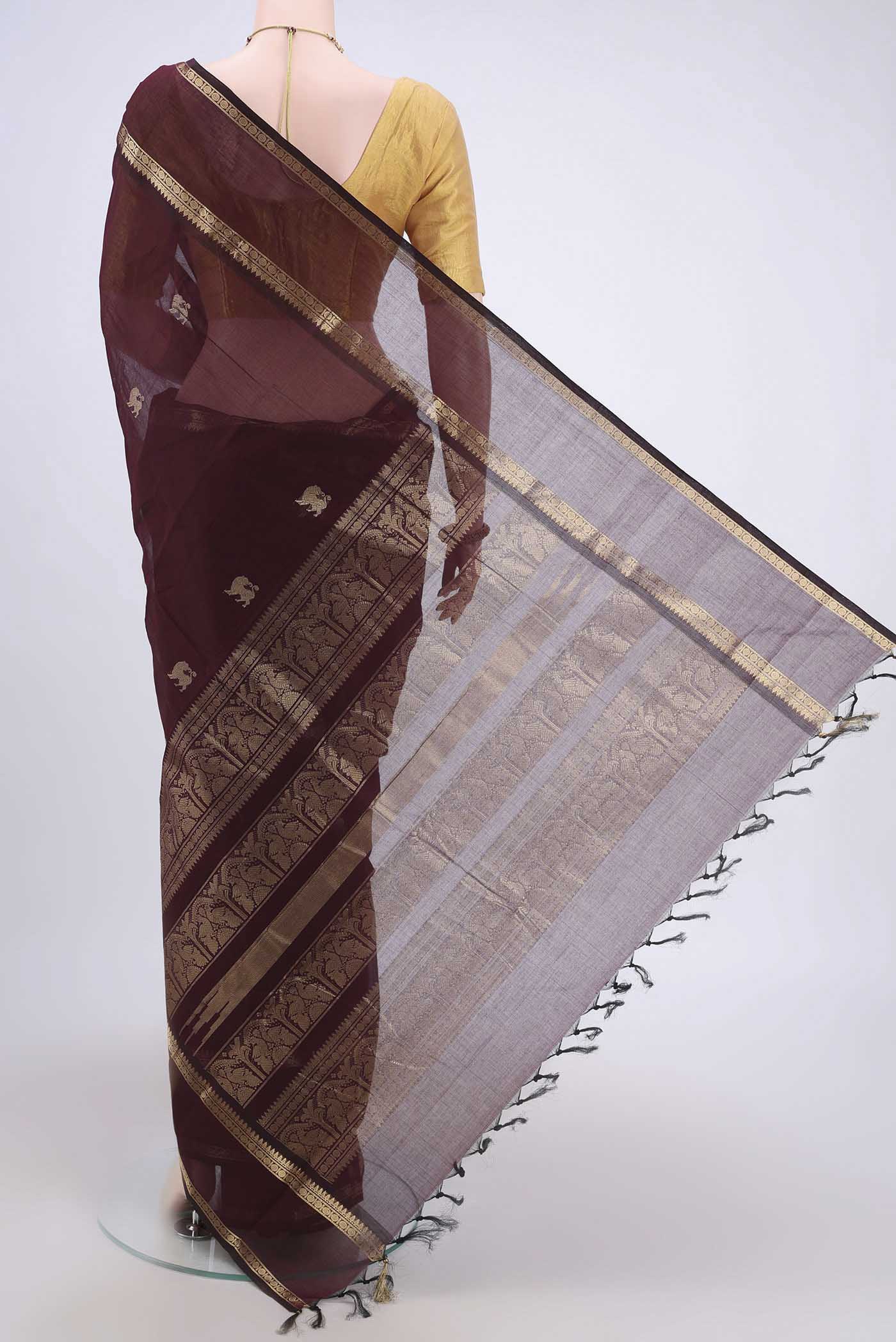 Flat view of Brown Kanchi Cotton Saree with Zari Butta on the body and Zari Border. 