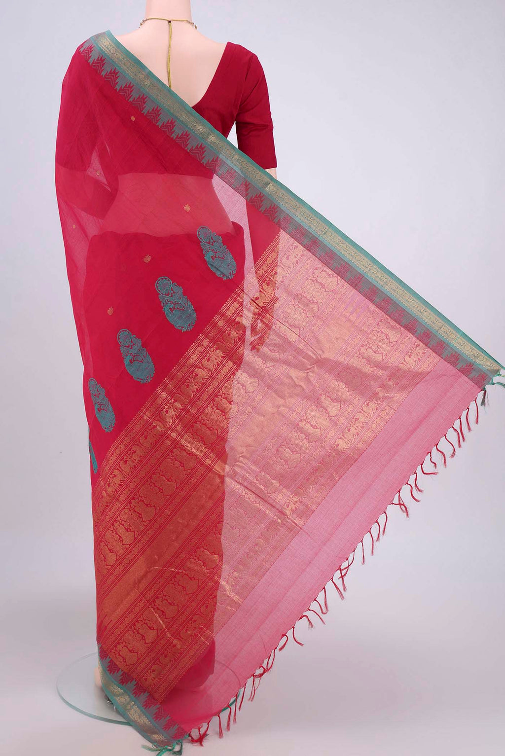 Flat view of Dark Pink Kanchi Cotton Saree with Zari Butta on the body and Zari Border. 