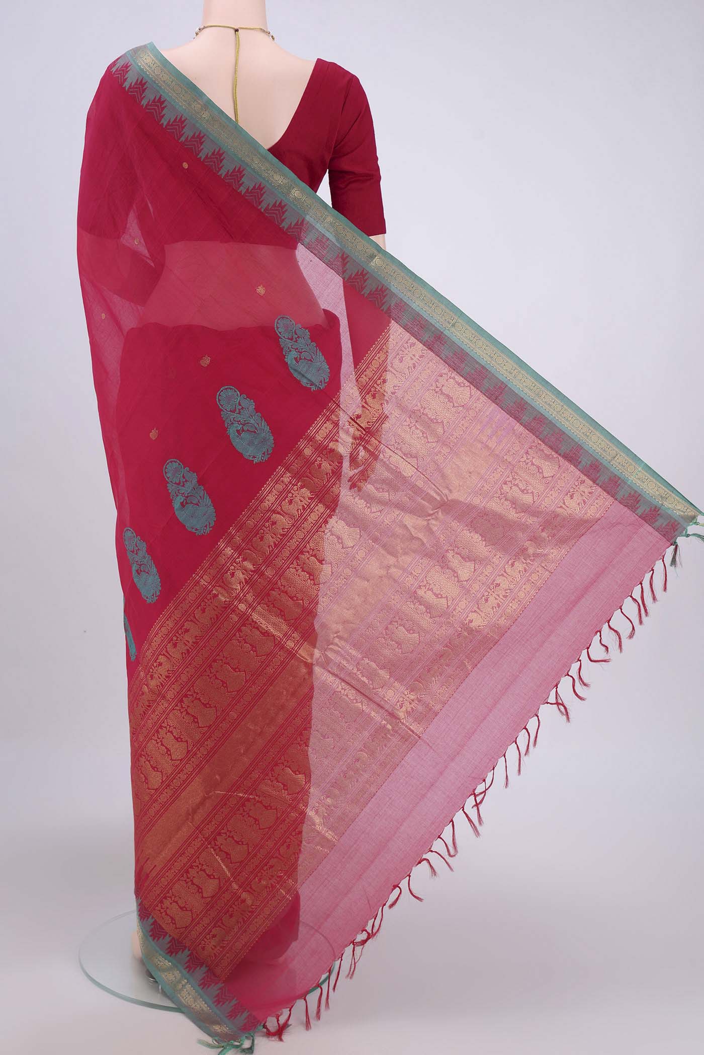 Flat view of Dark Pink Kanchi Cotton Saree with Zari Butta on the body and Zari Border. 