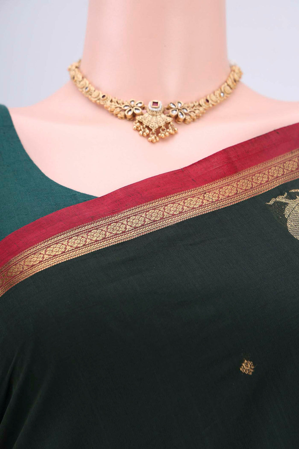 Border image of Bottle Green Kanchi Cotton Saree with Zari Butta on the body and Zari Border. 