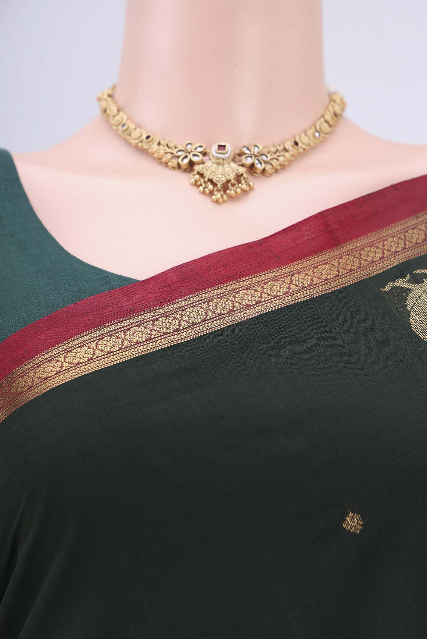 Border image of Bottle Green Kanchi Cotton Saree with Zari Butta on the body and Zari Border. 