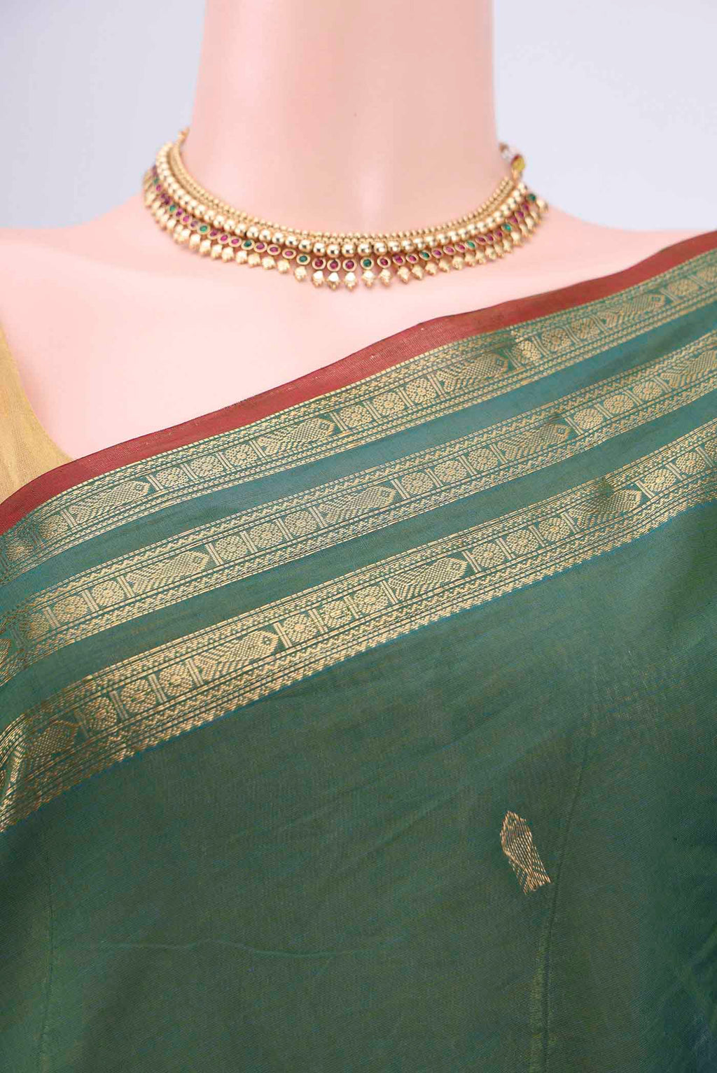 Border image of Green Kanchi Cotton Saree with Zari Butta on the body and Zari Border. 
