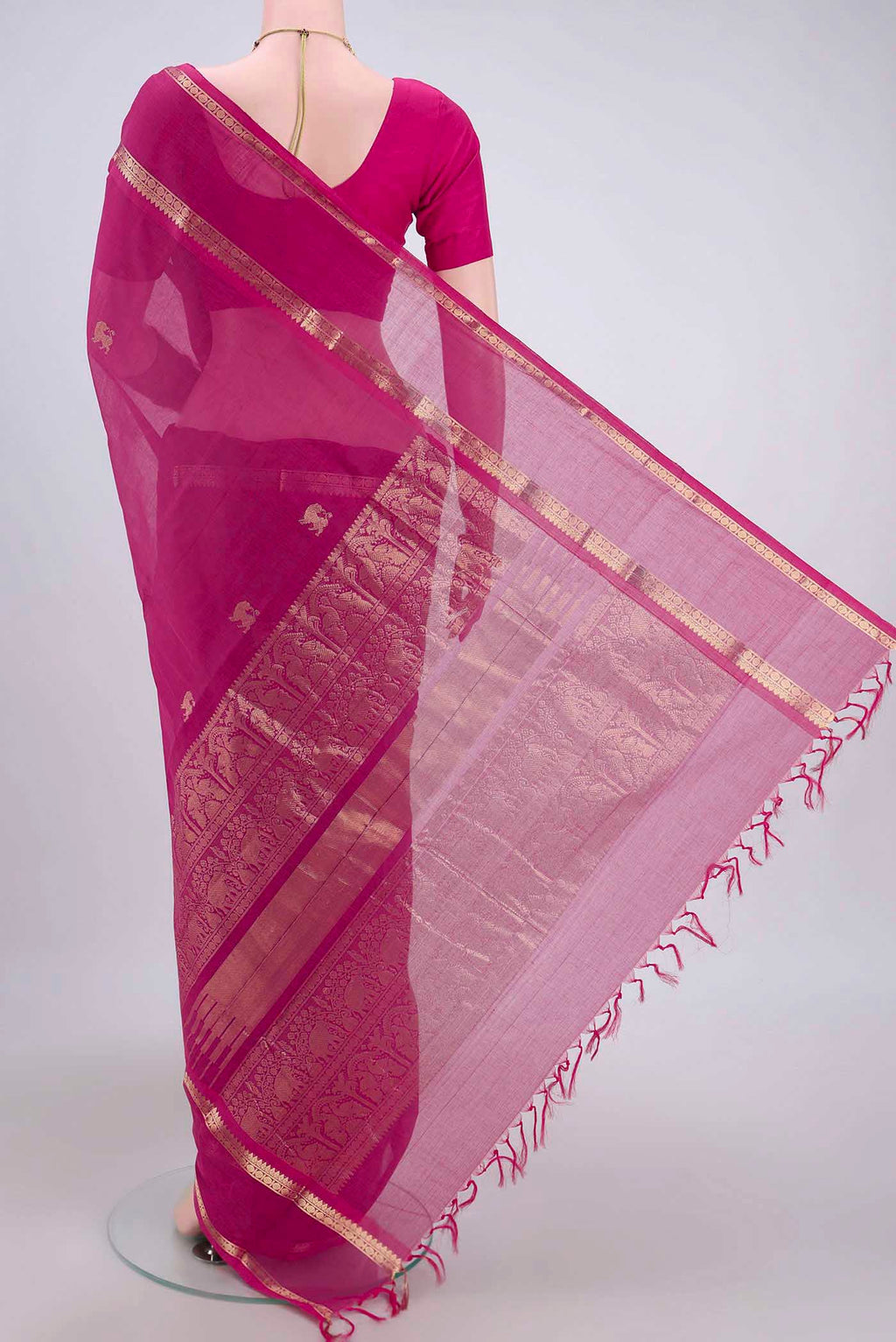 Flat view of Dark Pink Kanchi Cotton Saree with Plain Body and Zari Border. 