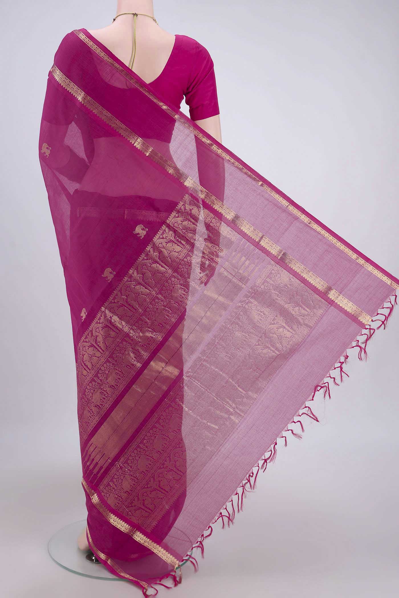 Flat view of Dark Pink Kanchi Cotton Saree with Plain Body and Zari Border. 