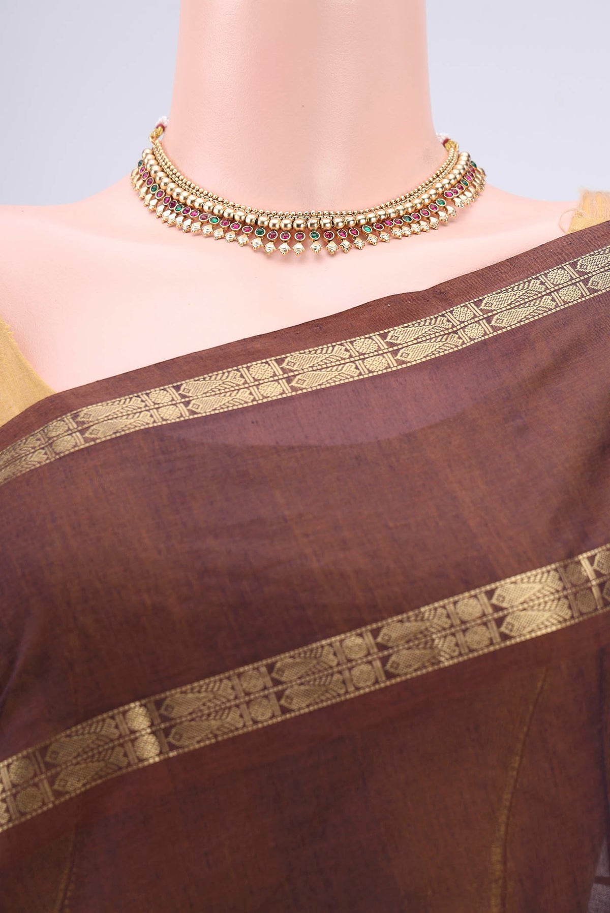 Border image of Brown Kanchi Cotton Saree with Plain Body and Zari Border. 