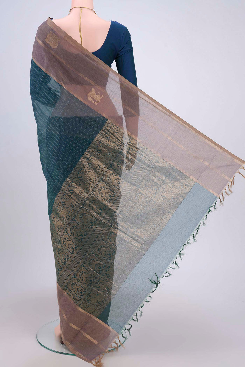 Flat view of Bottle Green Kanchi Cotton Saree with Checked design on the body and Zari Border. 