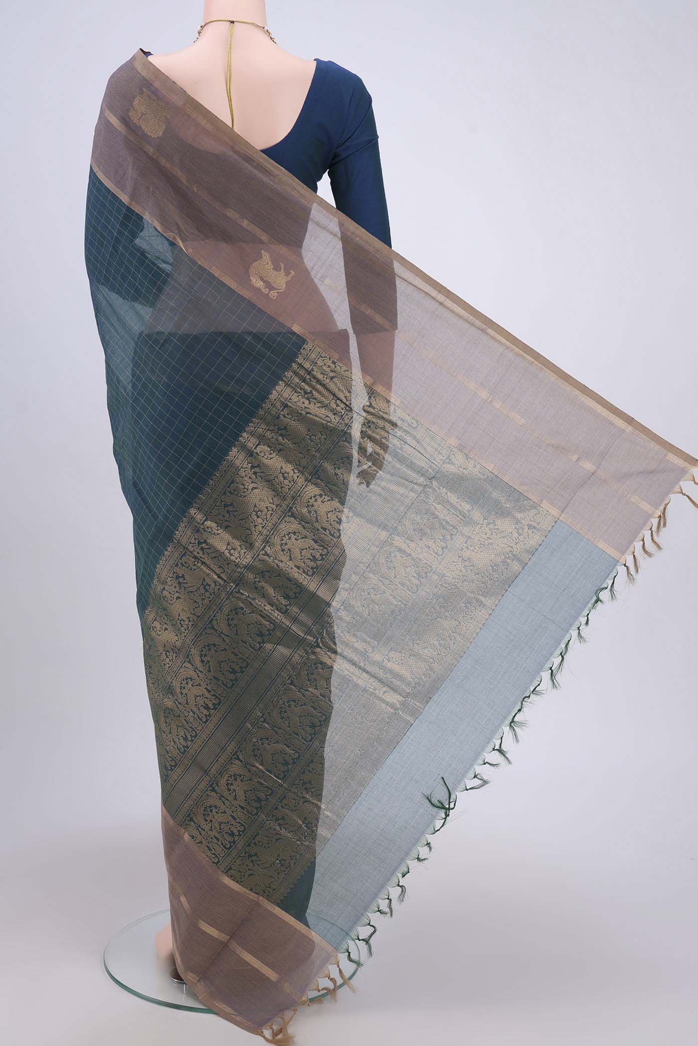 Flat view of Bottle Green Kanchi Cotton Saree with Checked design on the body and Zari Border. 