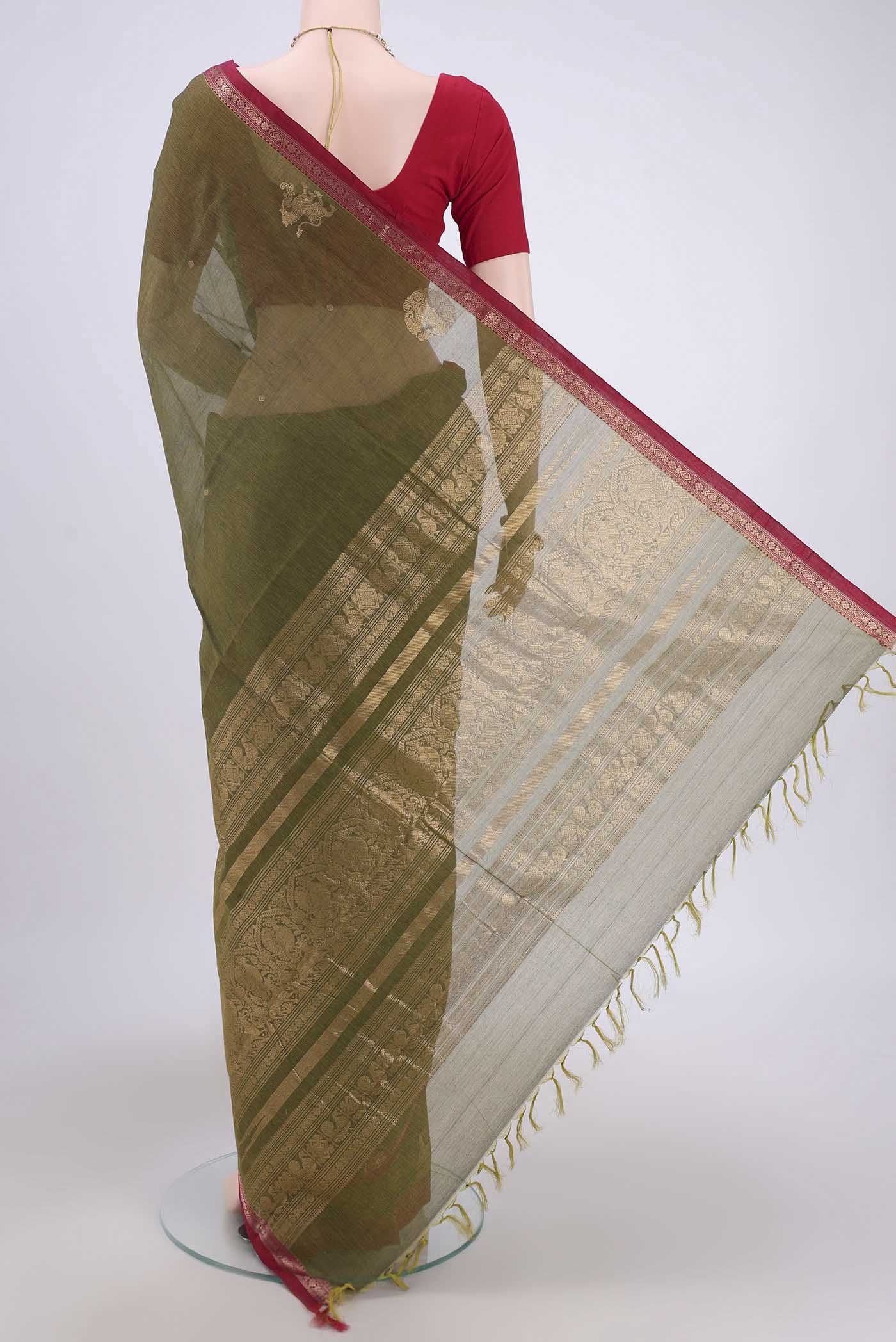 Flat view of Mehandi Green Kanchi Cotton Saree with Plain Body and Zari Border. 