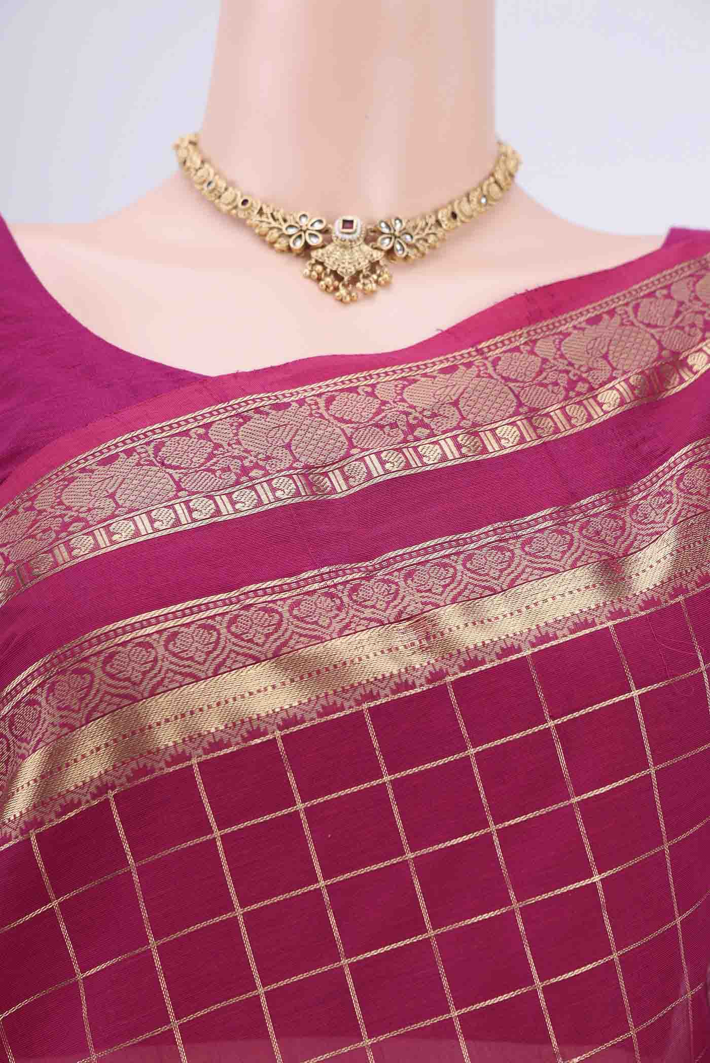 Border image of Rani Pink Kanchi Cotton Saree with Checked design on the body and Zari Border. 