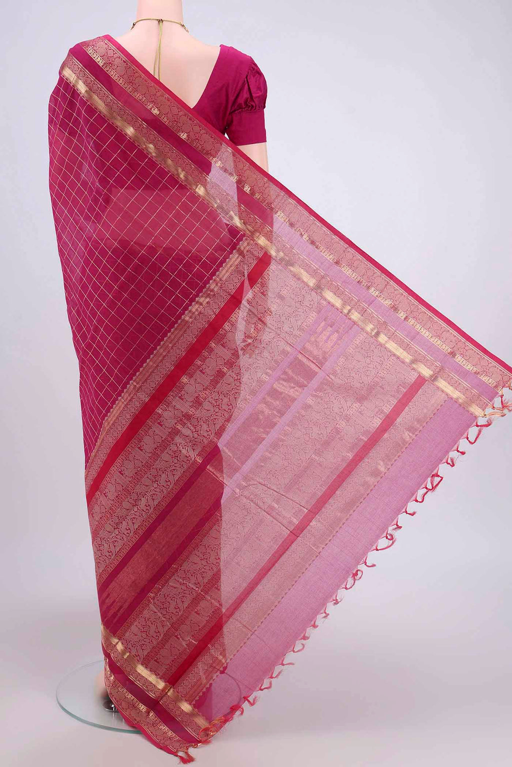 Flat view of Rani Pink Kanchi Cotton Saree with Checked design on the body and Zari Border. 