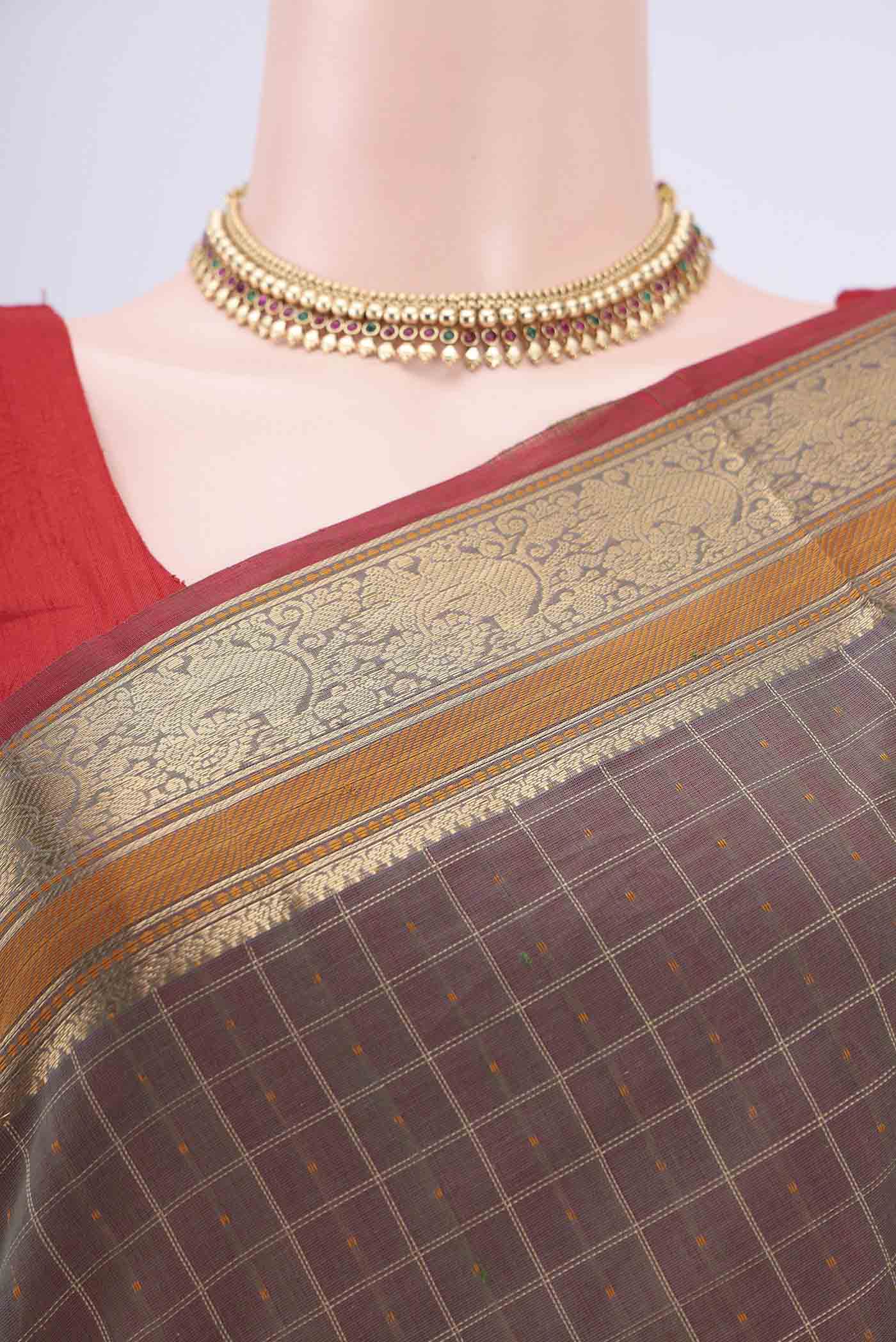 Border image of Grey Kanchi Cotton Saree with Checked design on the body and Zari Border. 