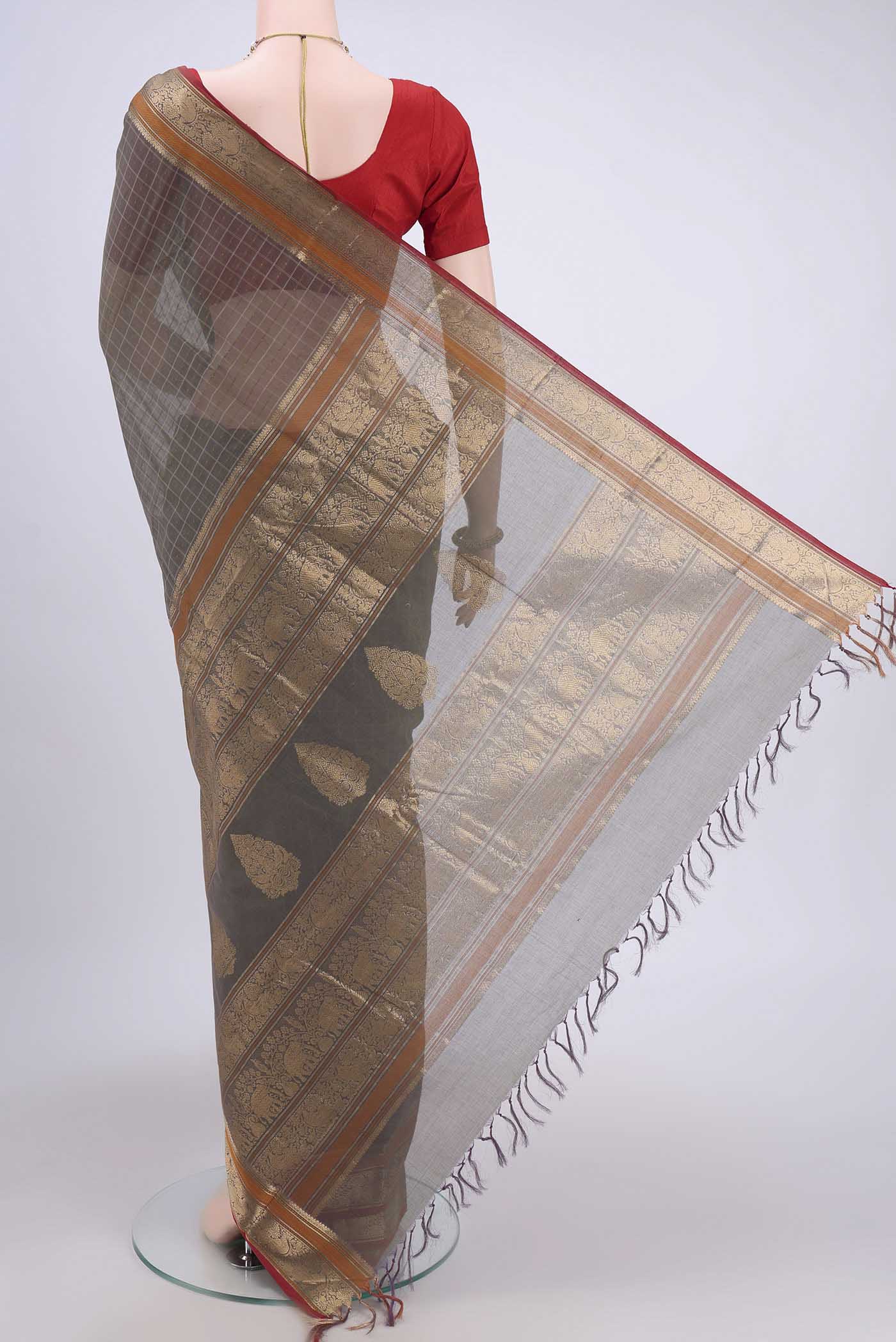 Flat view of Grey Kanchi Cotton Saree with Checked design on the body and Zari Border. 