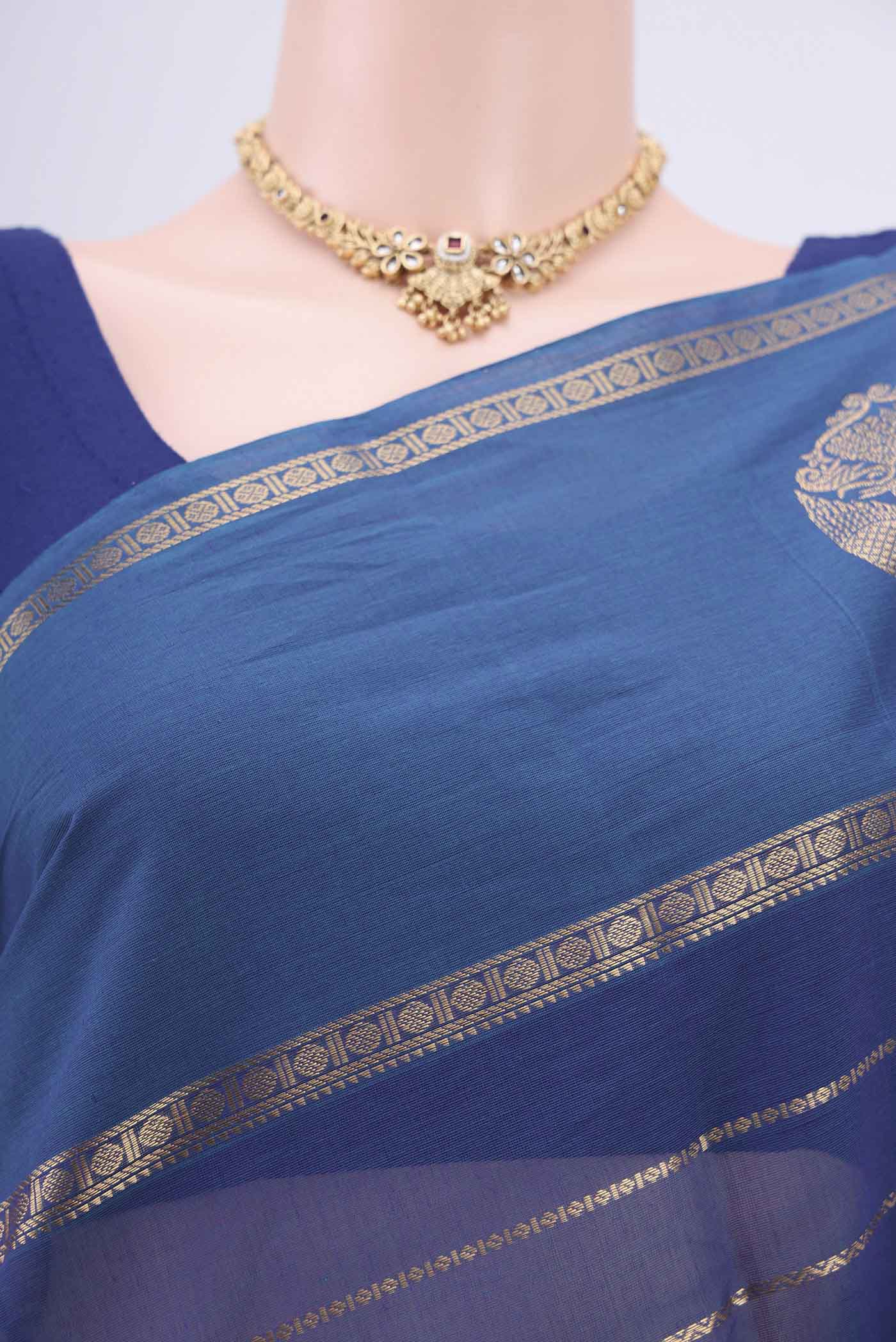 Border image of Peacock Blue Kanchi Cotton Saree with Stripes on the body and Zari Border. 