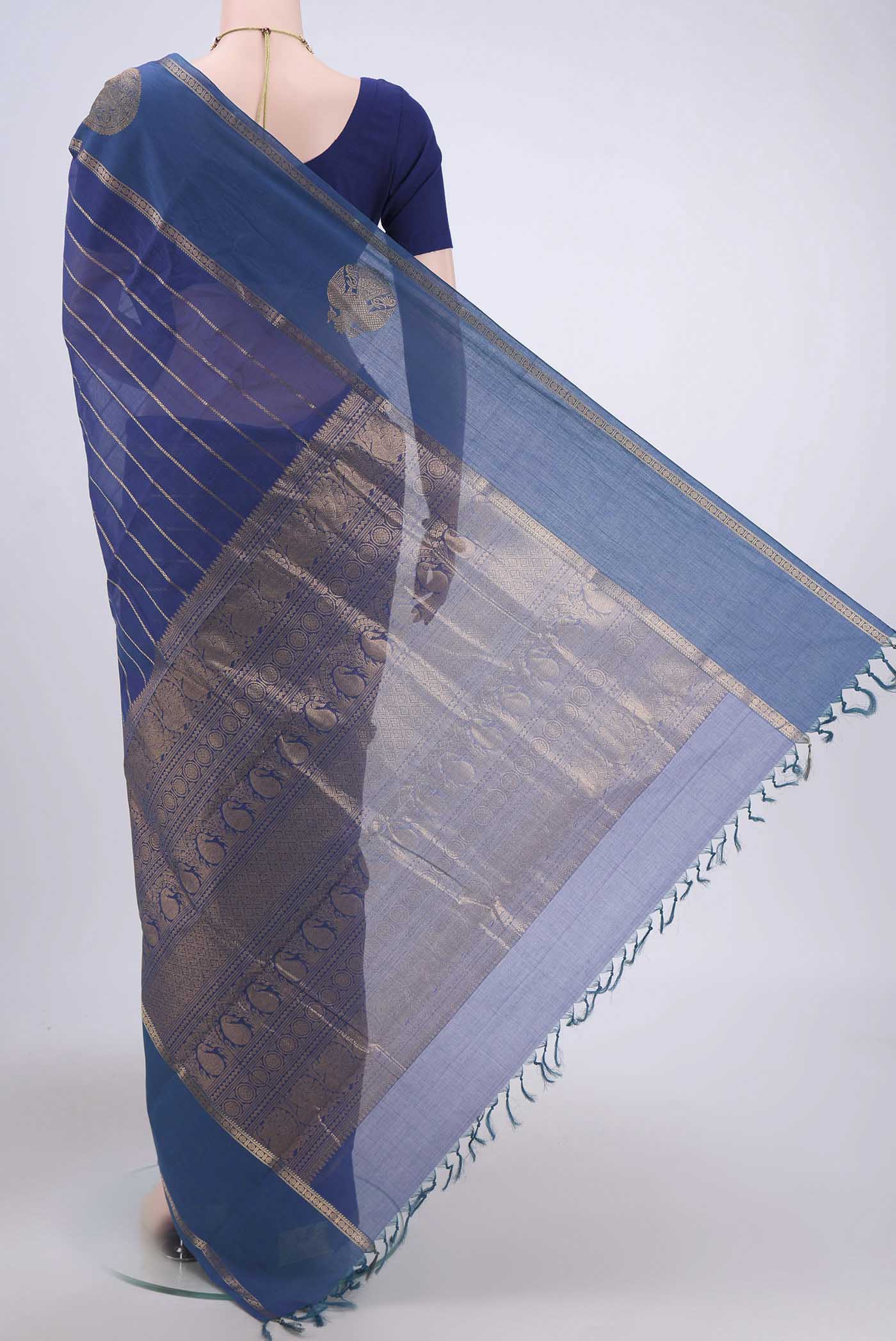 Flat view of Peacock Blue Kanchi Cotton Saree with Stripes on the body and Zari Border. 