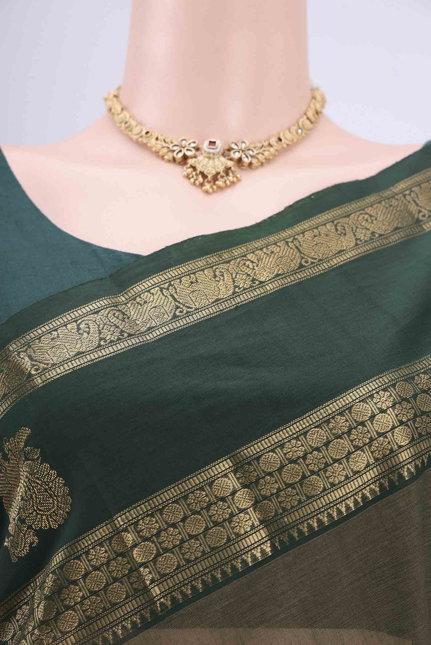 Border image of Mehandi Green Kanchi Cotton Saree with Plain Body and Zari Border. 