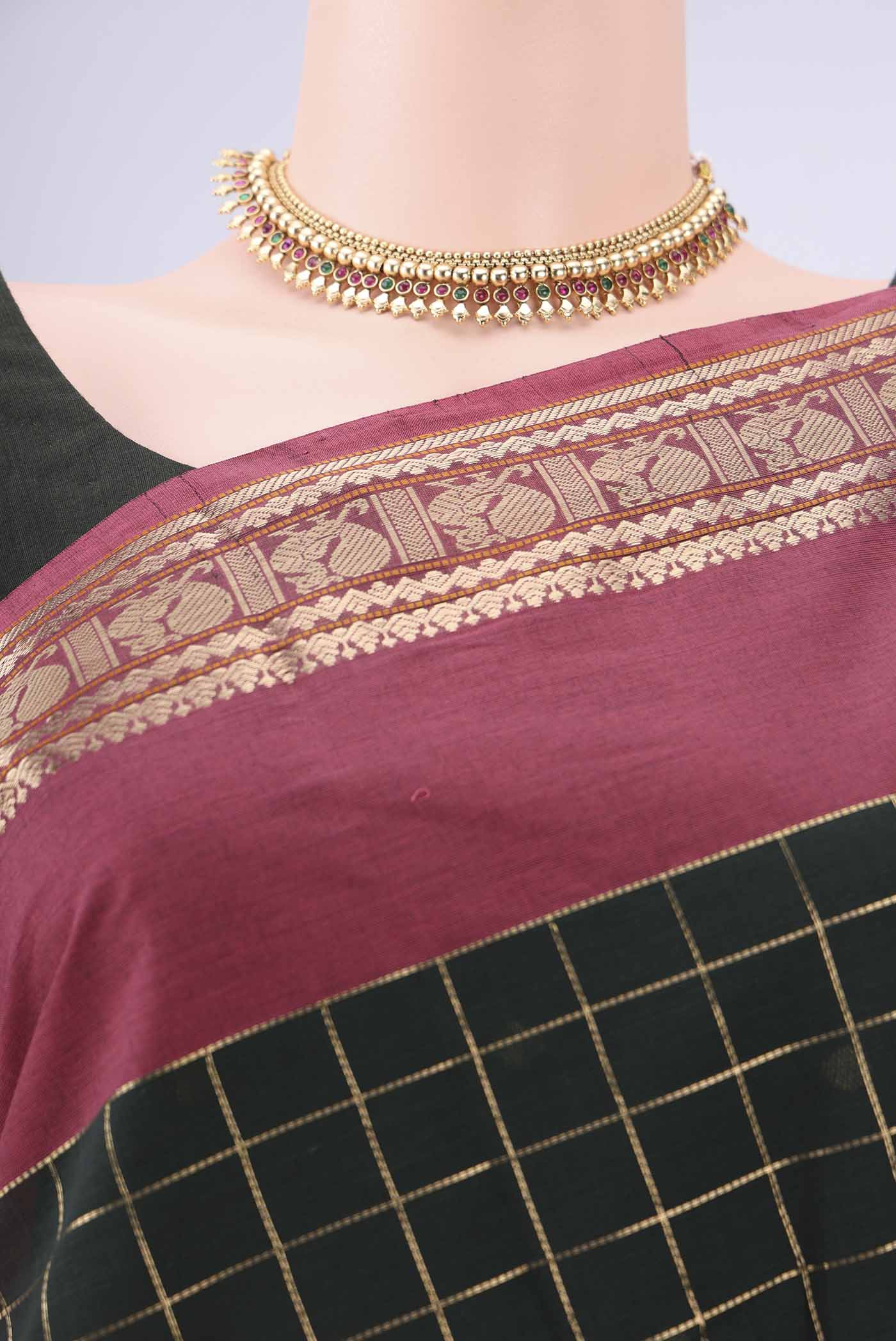 Border image of Bottle Green Kanchi Cotton Saree with Checked design on the body and Zari Border. 