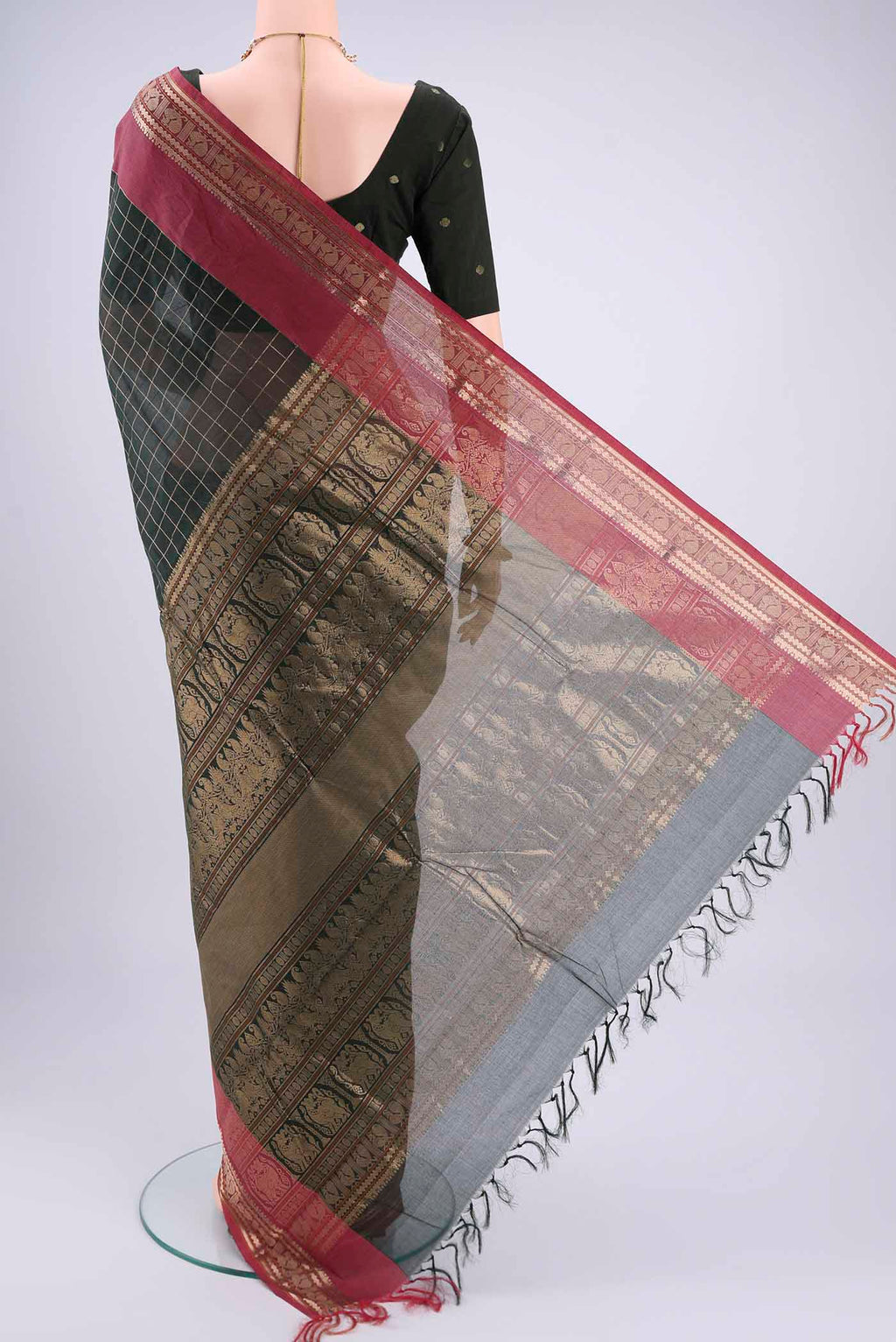 Flat view of Bottle Green Kanchi Cotton Saree with Checked design on the body and Zari Border. 