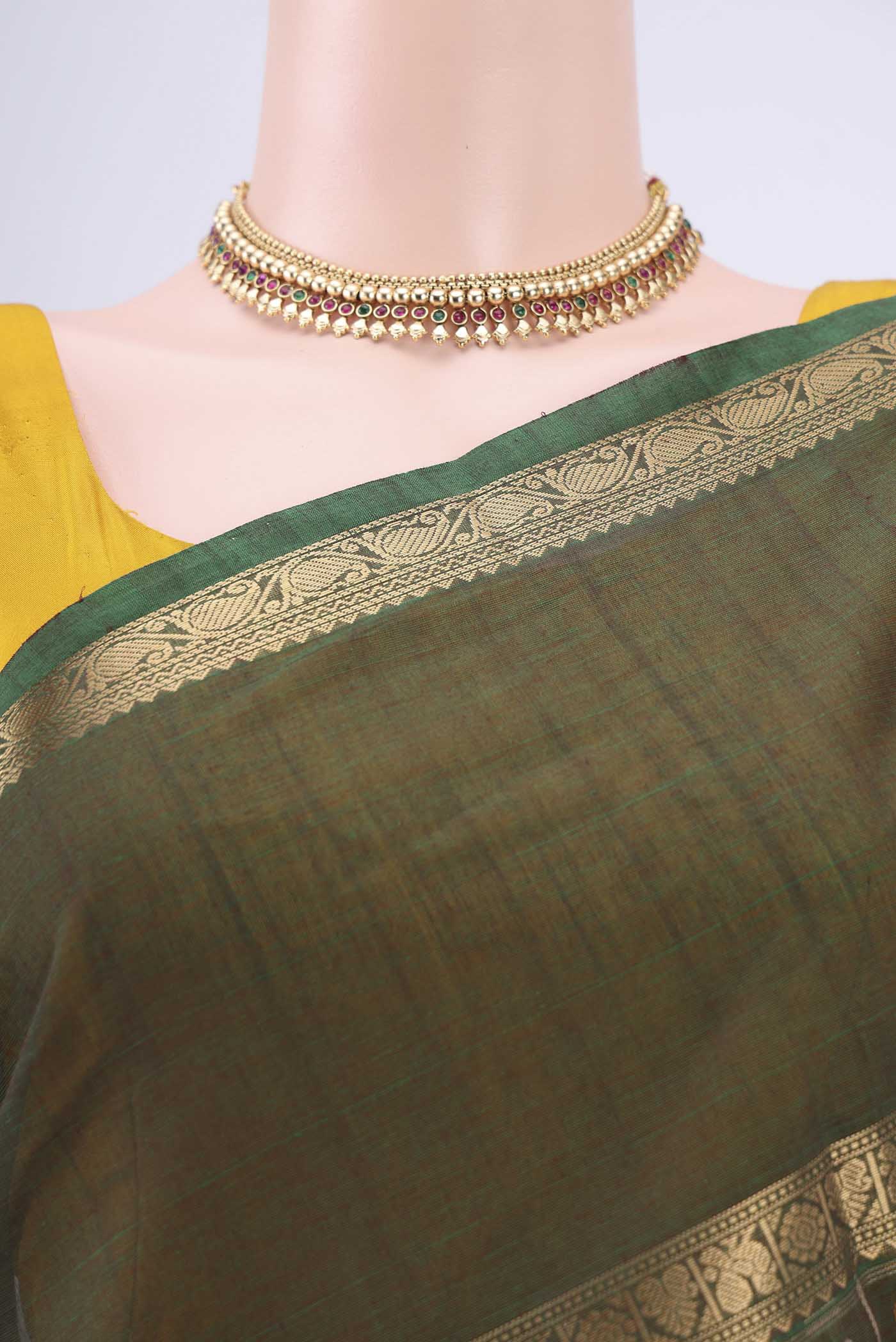 Border image of Green Kanchi Cotton Saree with Checked design on the body and Zari Border. 