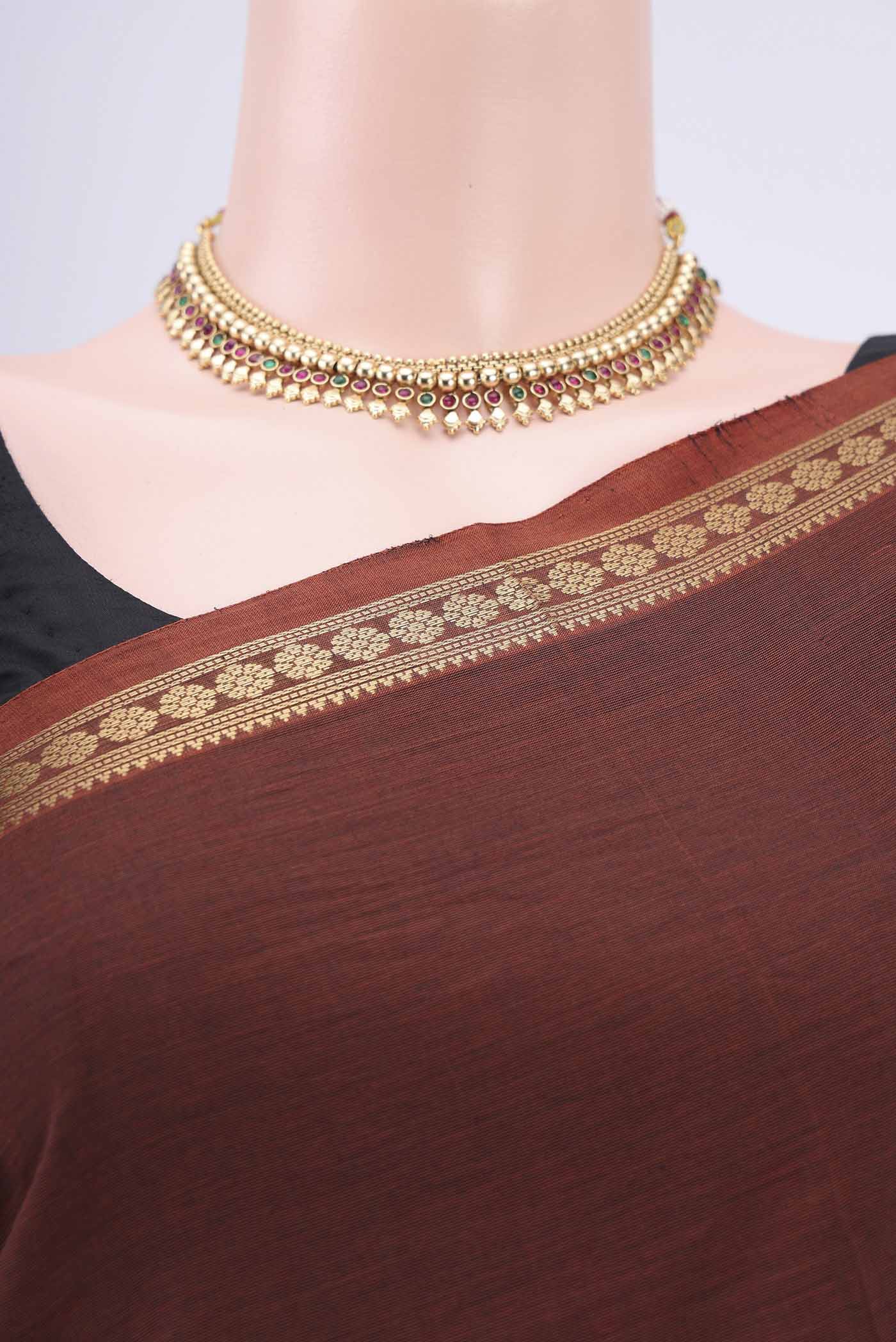 Border image of Black Kanchi Cotton Saree with Checked design on the body and Zari Border. 