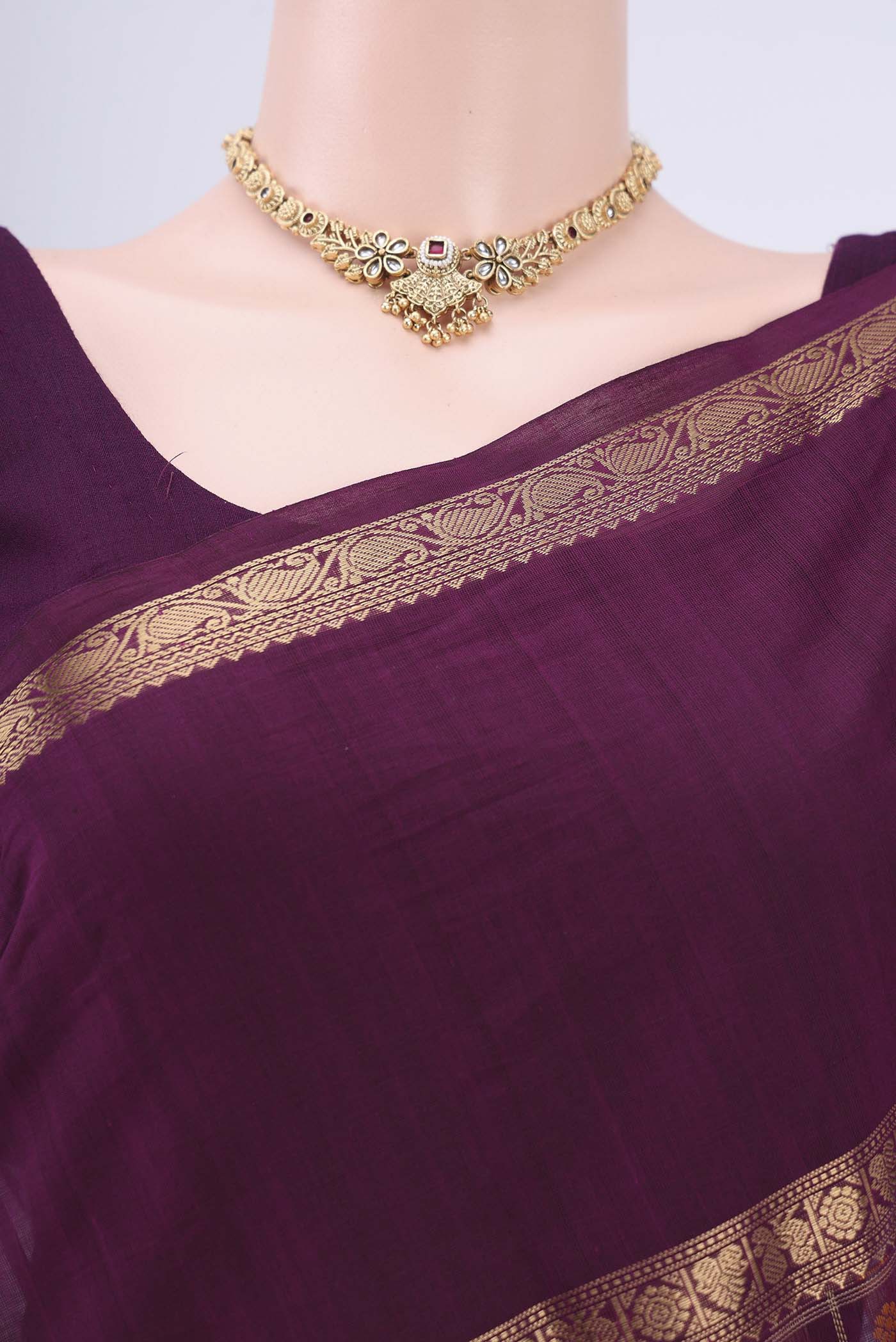 Border image of Magenta Kanchi Cotton Saree with Checked design on the body and Zari Border. 