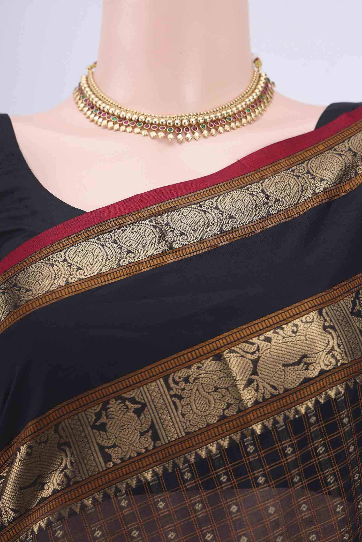 Border image of Black Kanchi Cotton Saree with Checked design on the body and Zari Border. 