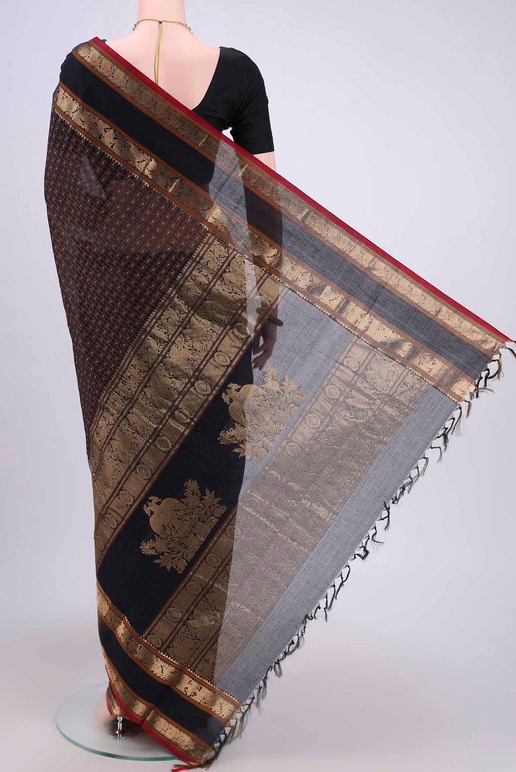 Flat view of Black Kanchi Cotton Saree with Checked design on the body and Zari Border. 