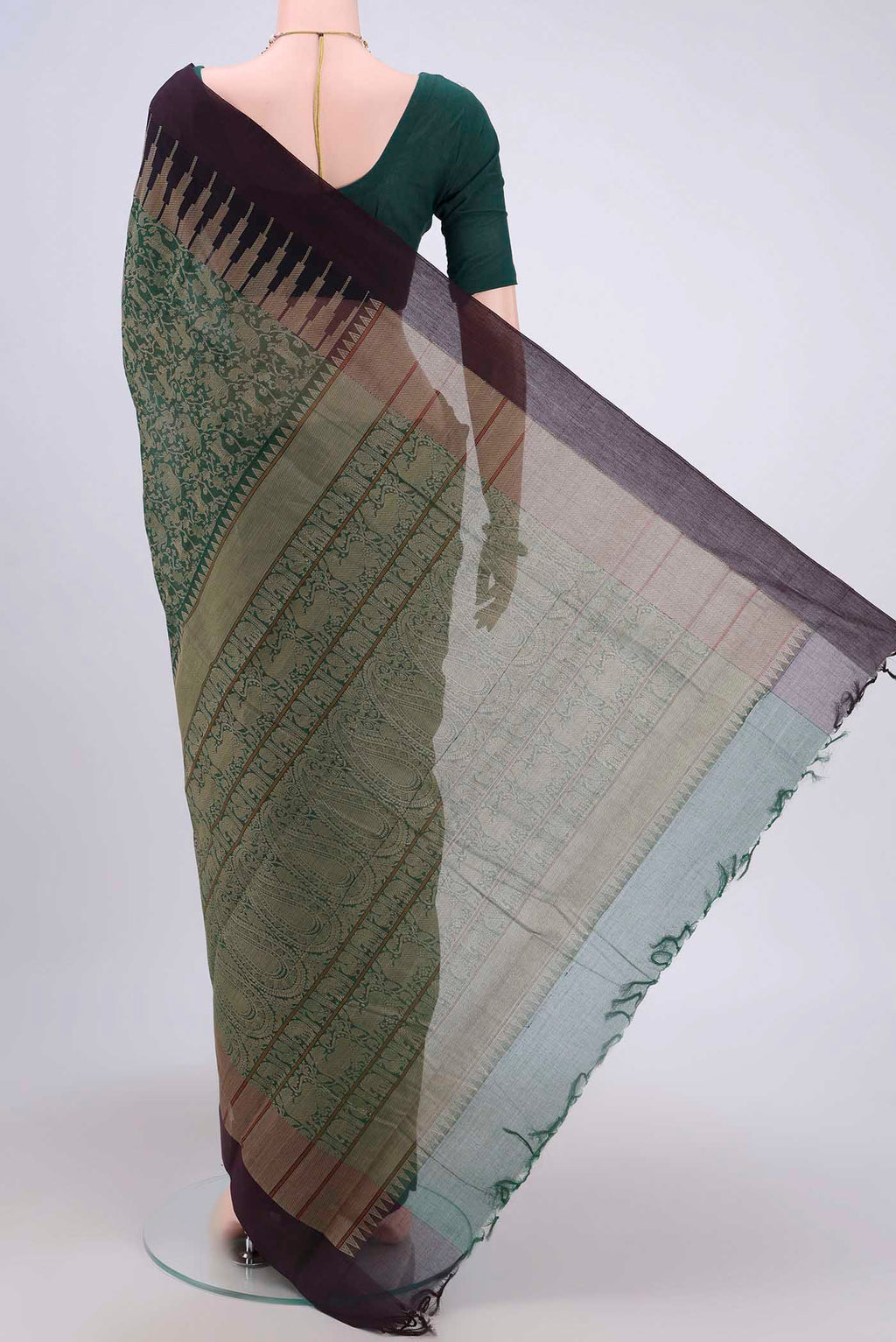 Flat view of Green Kanchi Cotton Saree with Jacquard design on the body and Thread Border. 