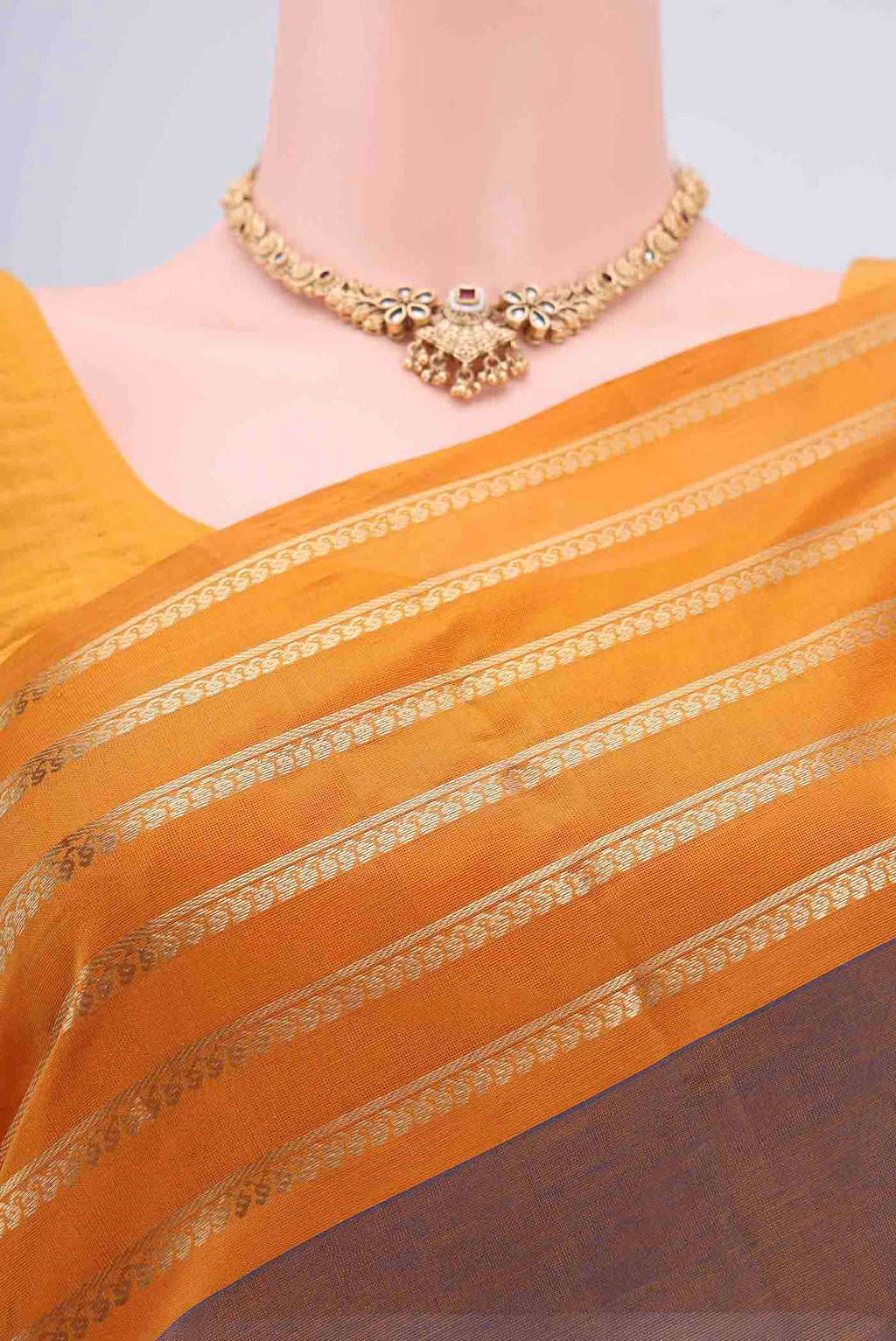 Border image of Brown Dual Tone Blended Coimbatore Silk Cotton Saree with Zari Butta on the body and Zari Border. 