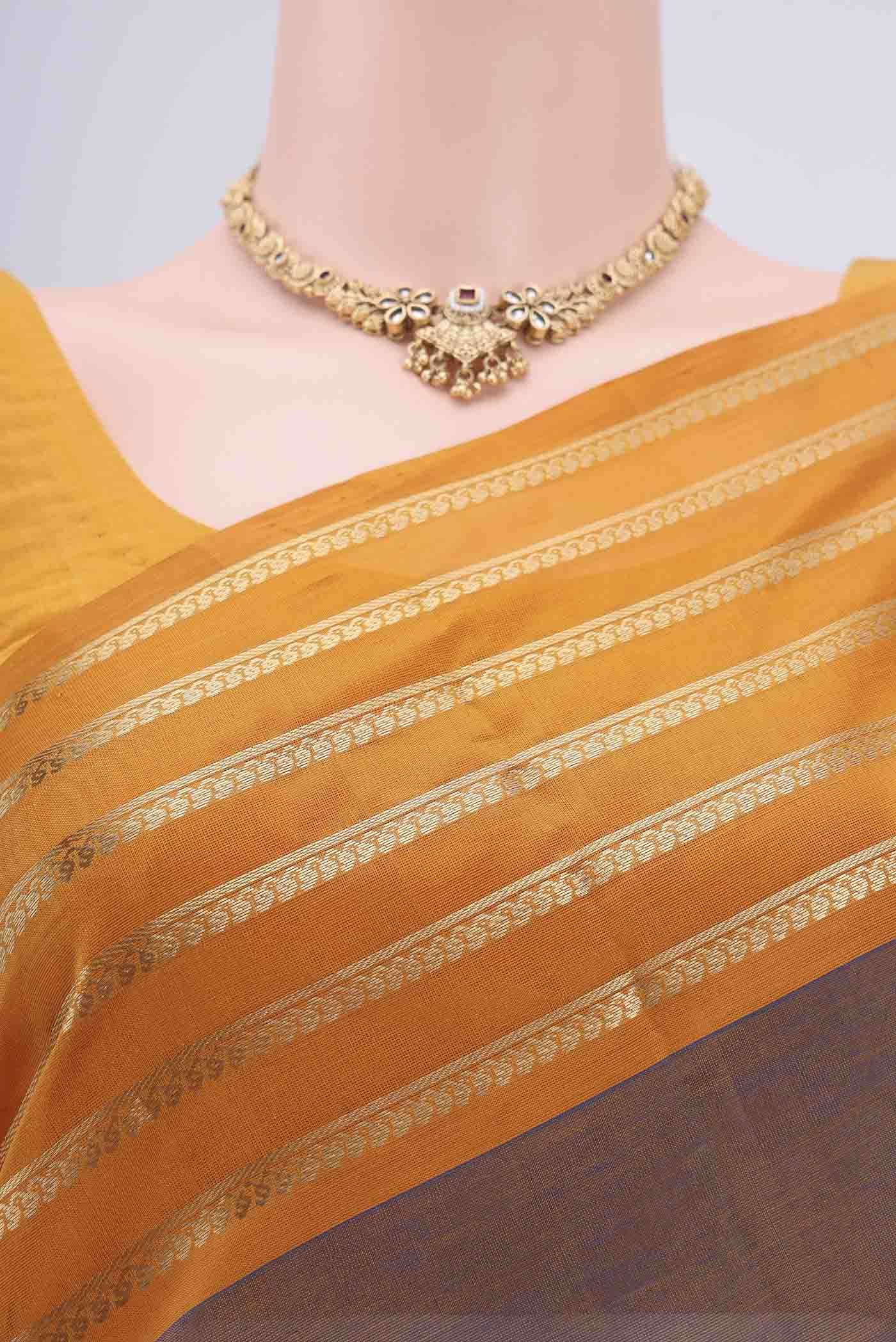 Border image of Brown Dual Tone Blended Coimbatore Silk Cotton Saree with Zari Butta on the body and Zari Border. 