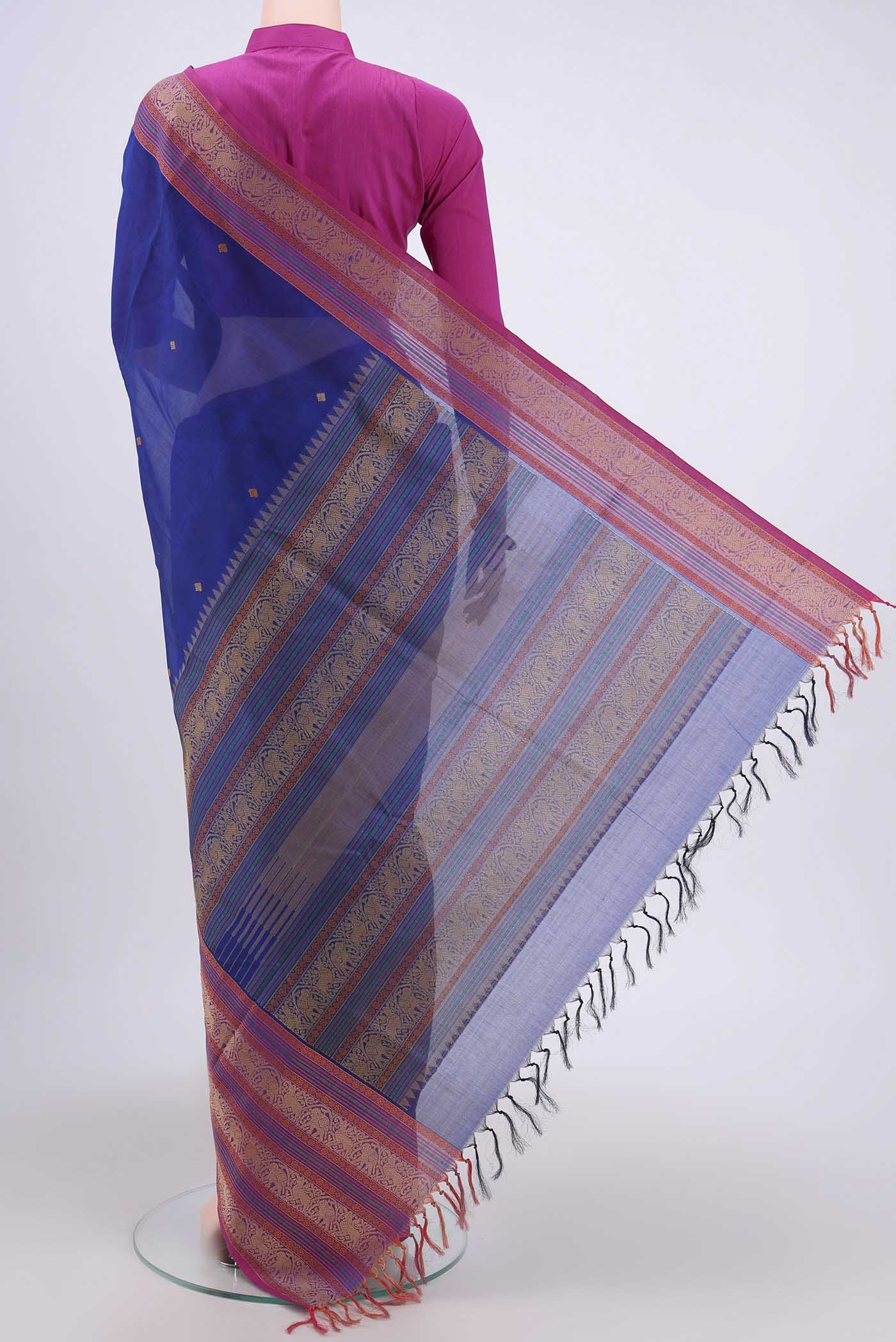 Flat view of Royal Blue Silk Cotton Saree with Thread Butta on the body and Zari Border. 