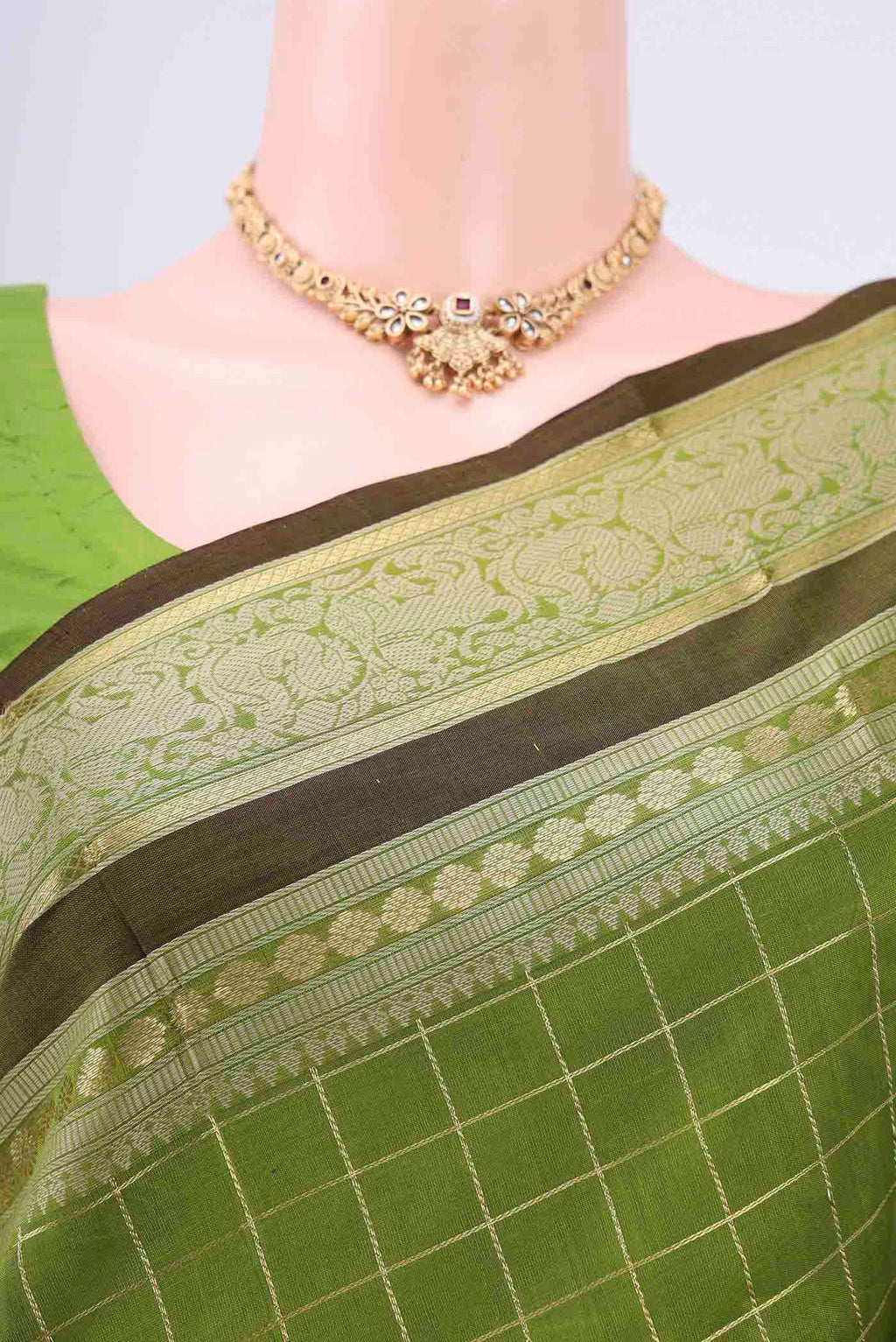 Border image of Light Green Silk Cotton Saree with Checked design on the body and Zari And Thread Border. 