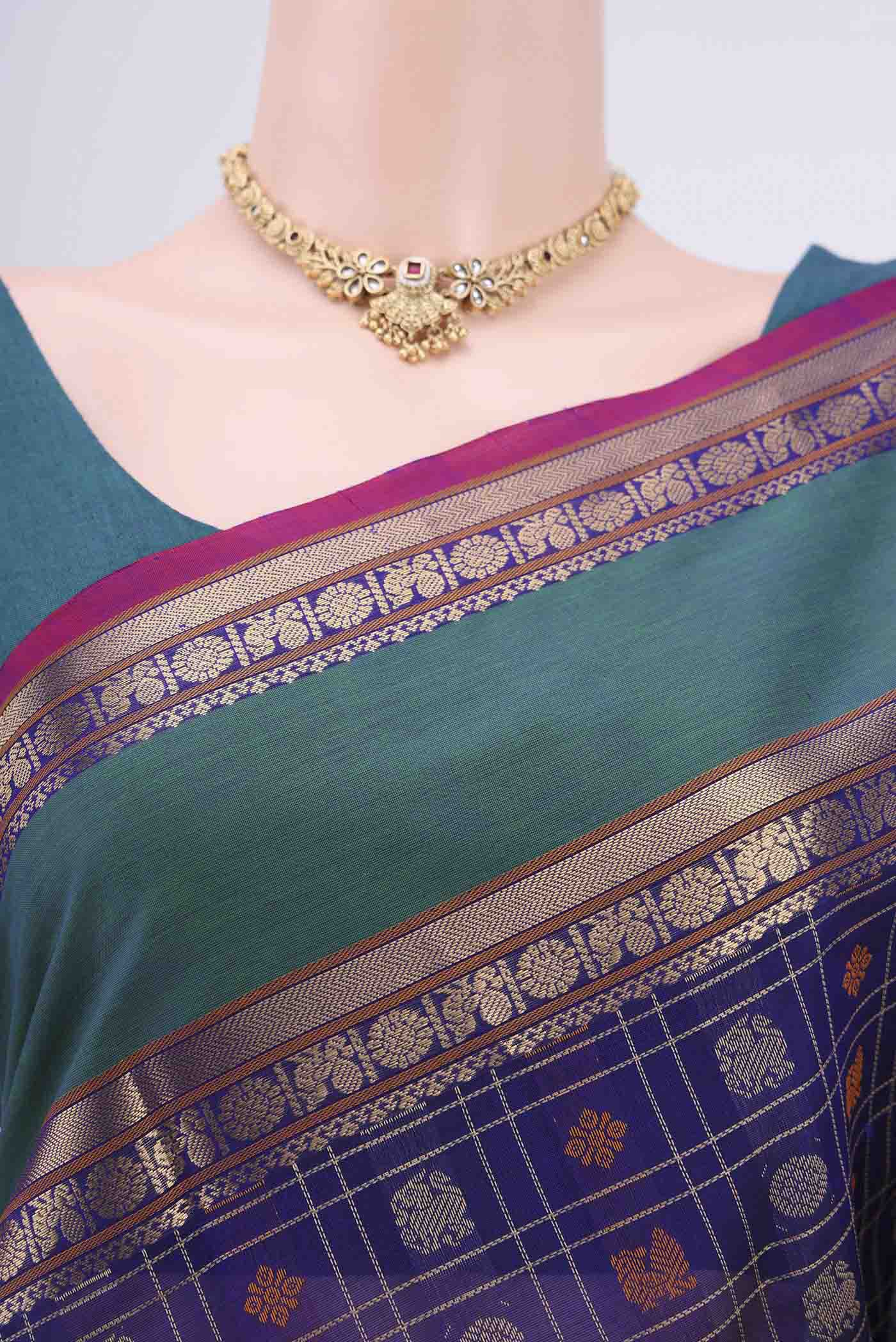 Border image of Purple Silk Cotton Saree with Checked design on the body and Zari Border. 