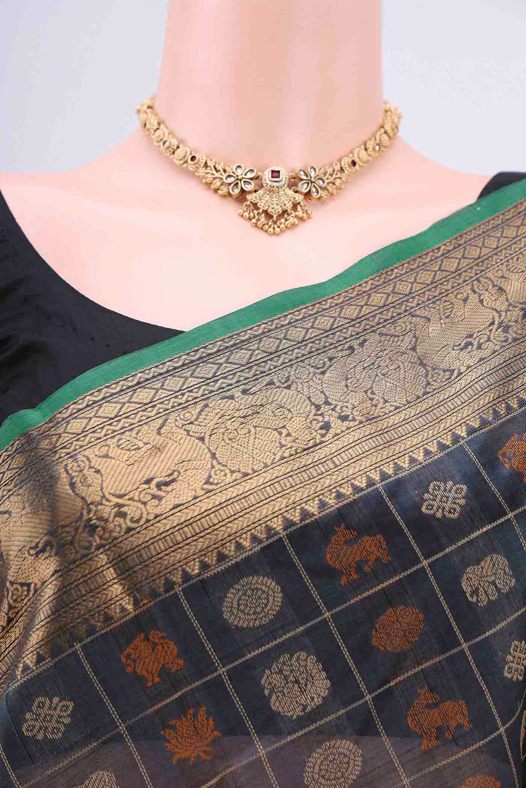 Border image of Davys Grey Silk Cotton Saree with Checked design on the body and Zari Border. 