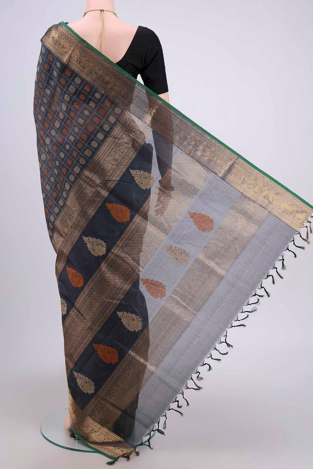 Flat view of Davys Grey Silk Cotton Saree with Checked design on the body and Zari Border. 