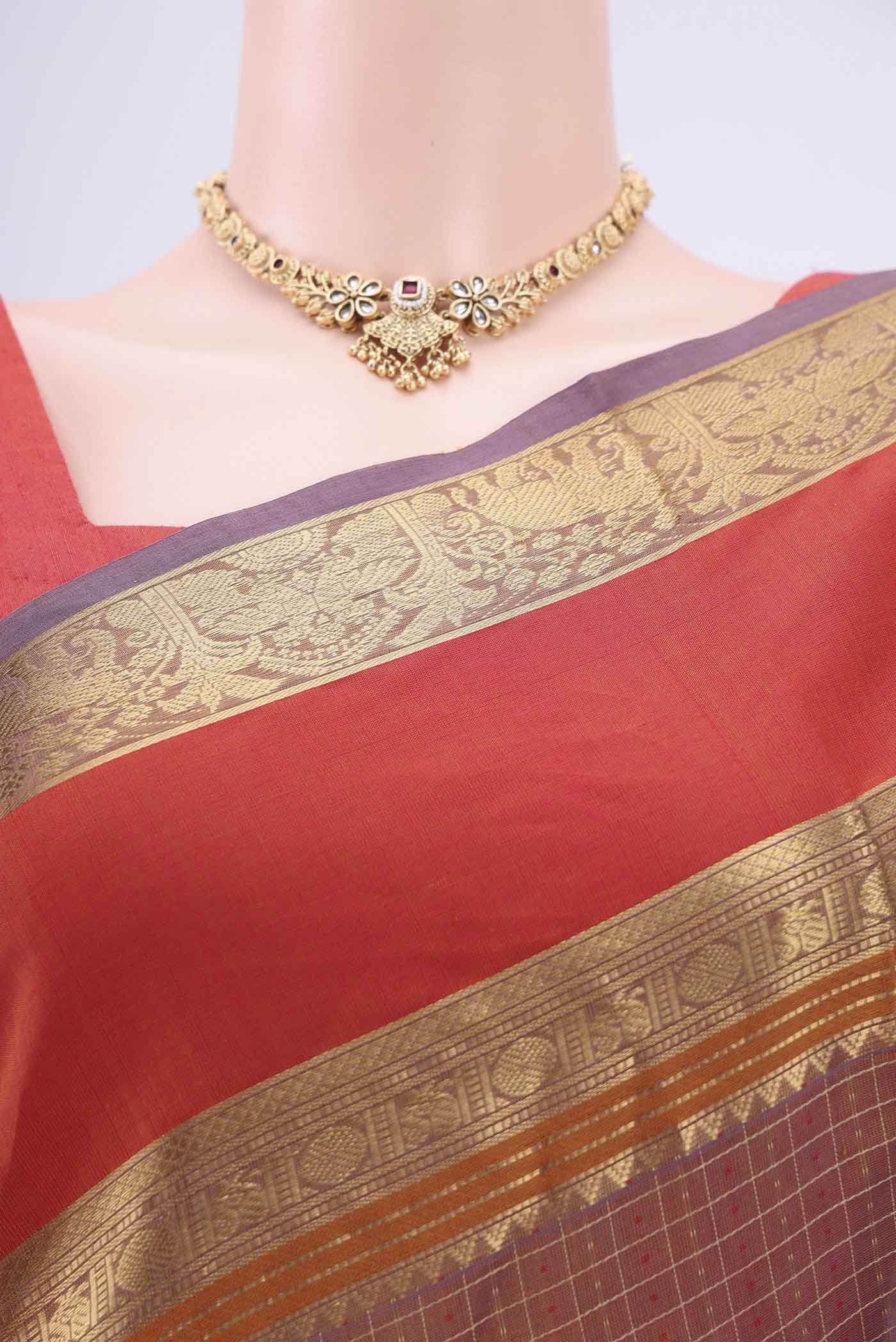 Border image of Brown Dual Tone Silk Cotton Saree with Checked design on the body and Zari And Thread Border. 