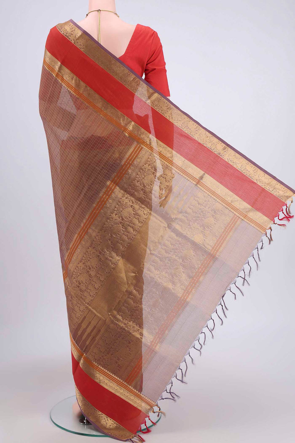 Flat view of Brown Dual Tone Silk Cotton Saree with Checked design on the body and Zari And Thread Border. 
