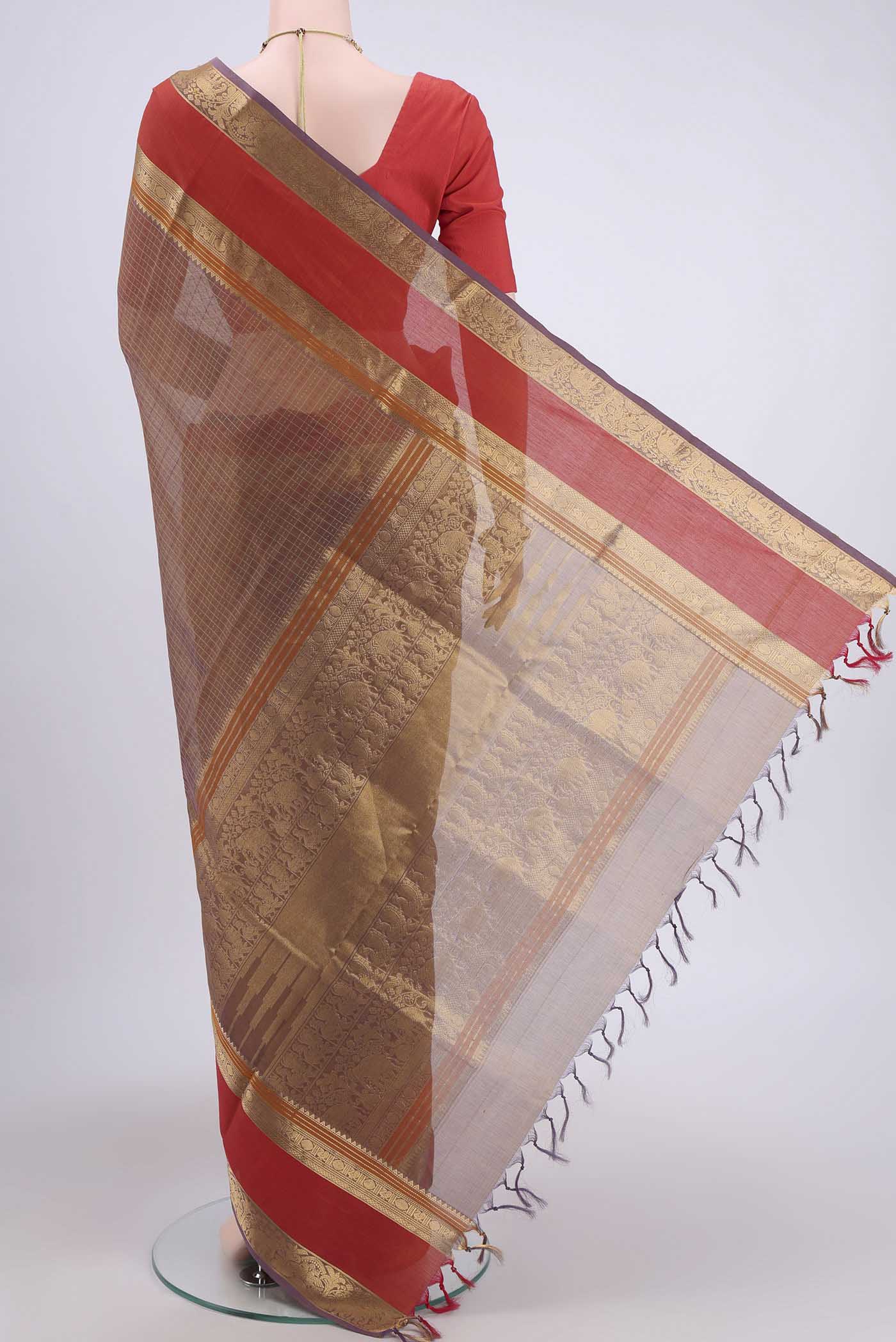 Flat view of Brown Dual Tone Silk Cotton Saree with Checked design on the body and Zari And Thread Border. 