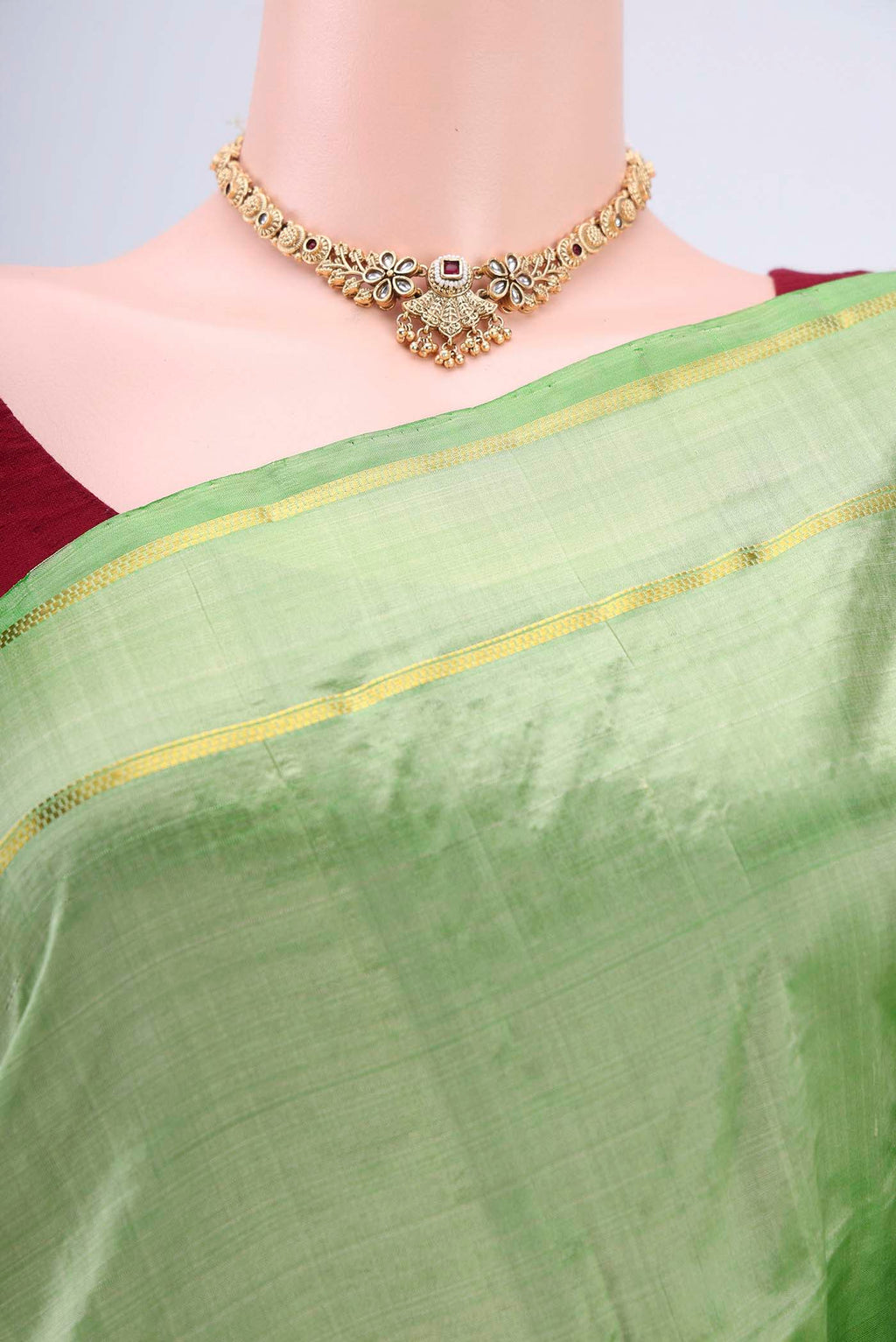 Border image of Light Green Kanchipuram Saree with Plain Body and Zari And Thread Border. 