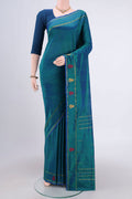 Peacock Blue Dual Tone Kanchipuram Silk Saree with Plain Body and Thread Border.  displayed on a mannequin