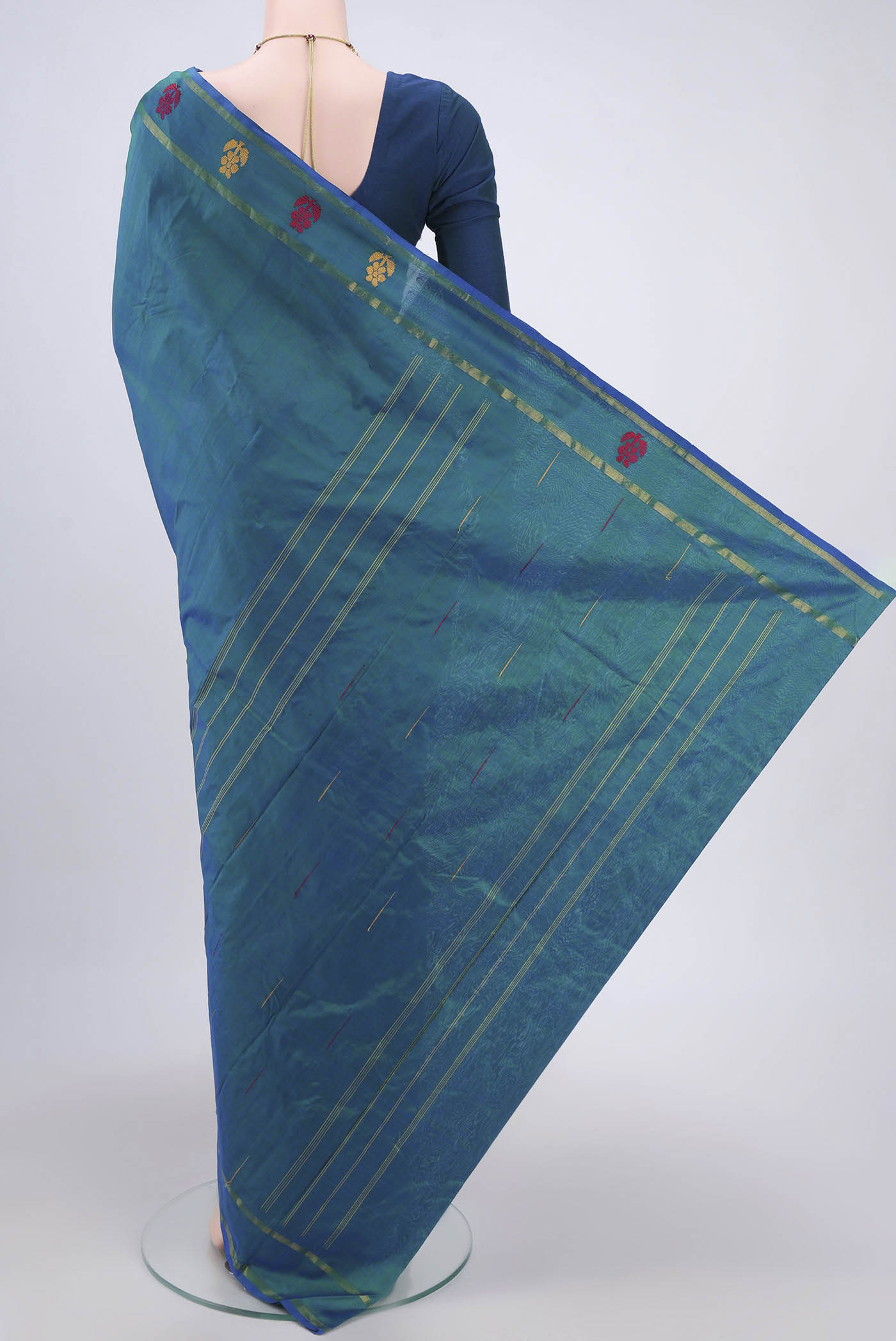 Flat view of Peacock Blue Dual Tone Kanchipuram Silk Saree with Plain Body and Thread Border. 