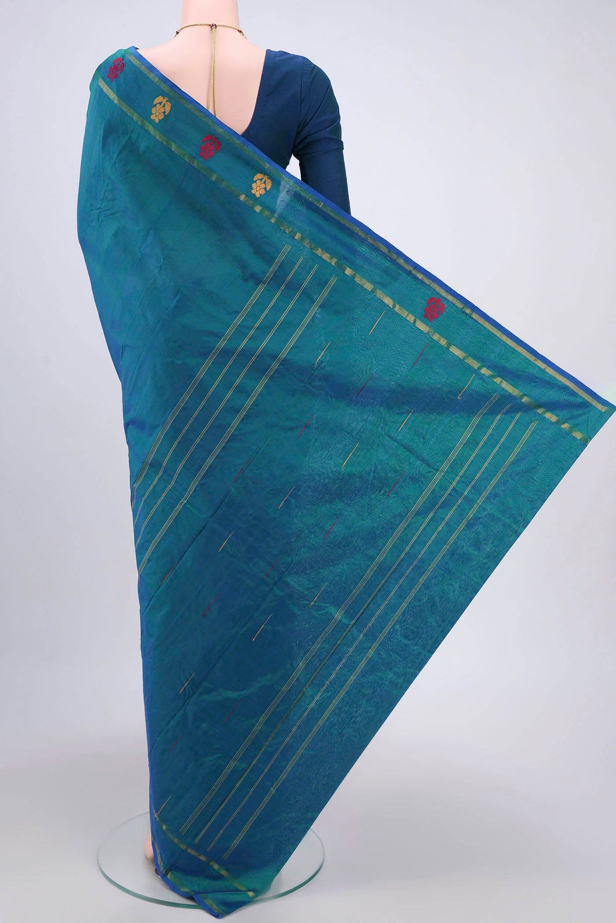 Flat view of Peacock Blue Dual Tone Kanchipuram Silk Saree with Plain Body and Thread Border. 