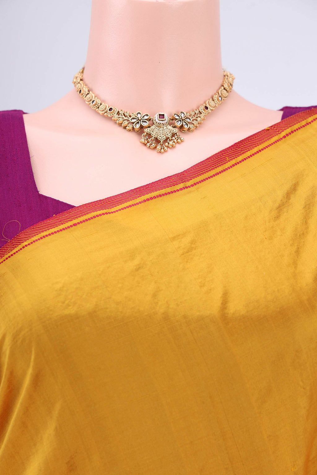 Border image of Mustard Kanchipuram Silk Saree with Thread Butta on the body and Thread Border. 