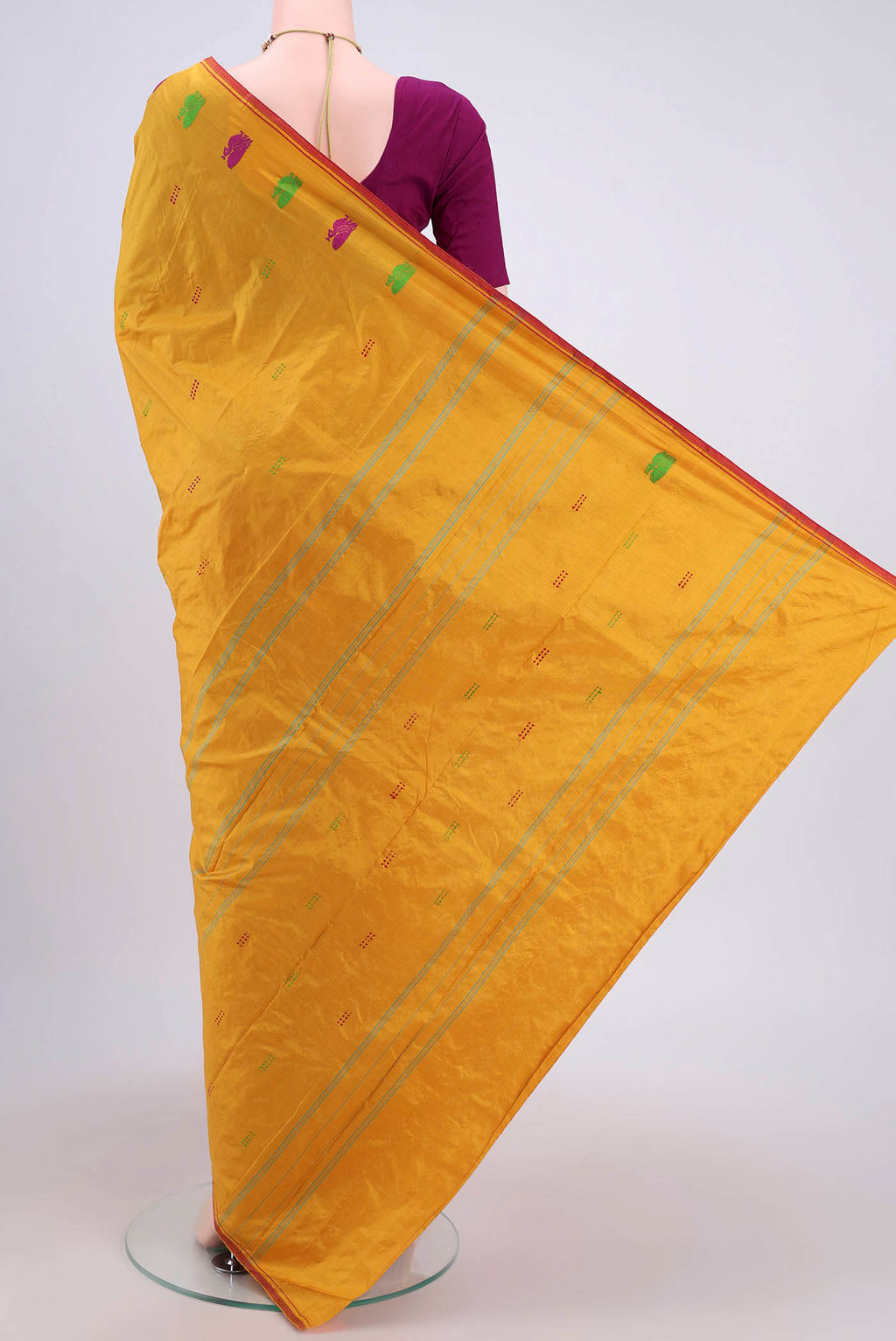 Flat view of Mustard Kanchipuram Silk Saree with Thread Butta on the body and Thread Border. 