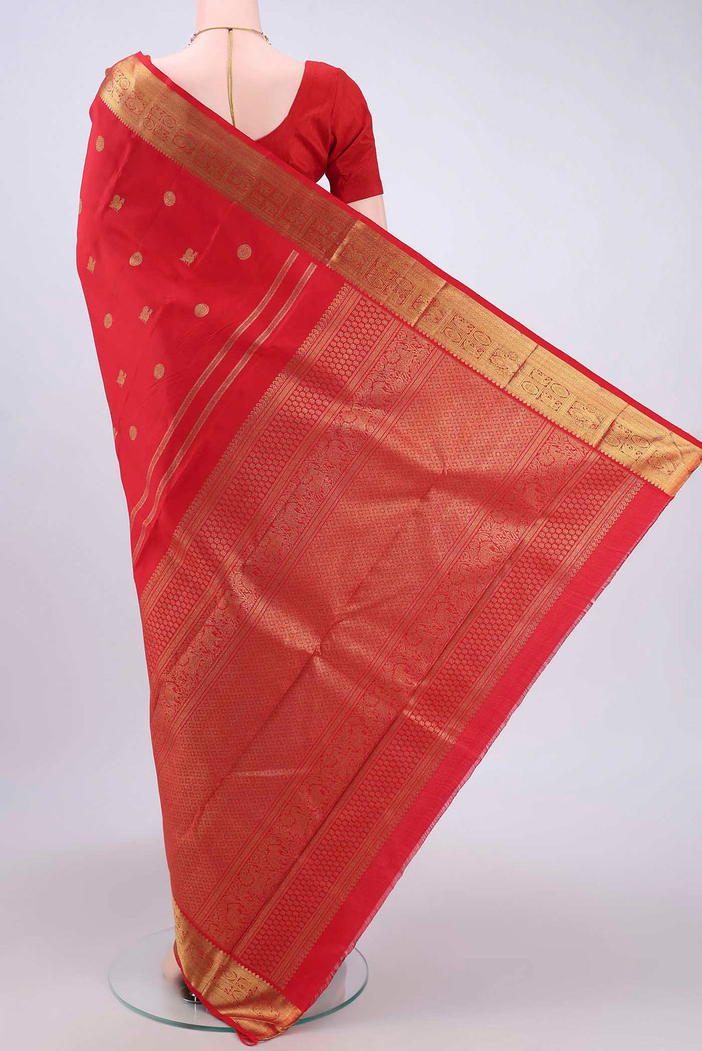 Flat view of Pure Silk Pure Zari Red Dual Tone Kanchipuram Saree with Zari Butta on the body and Zari Border. 